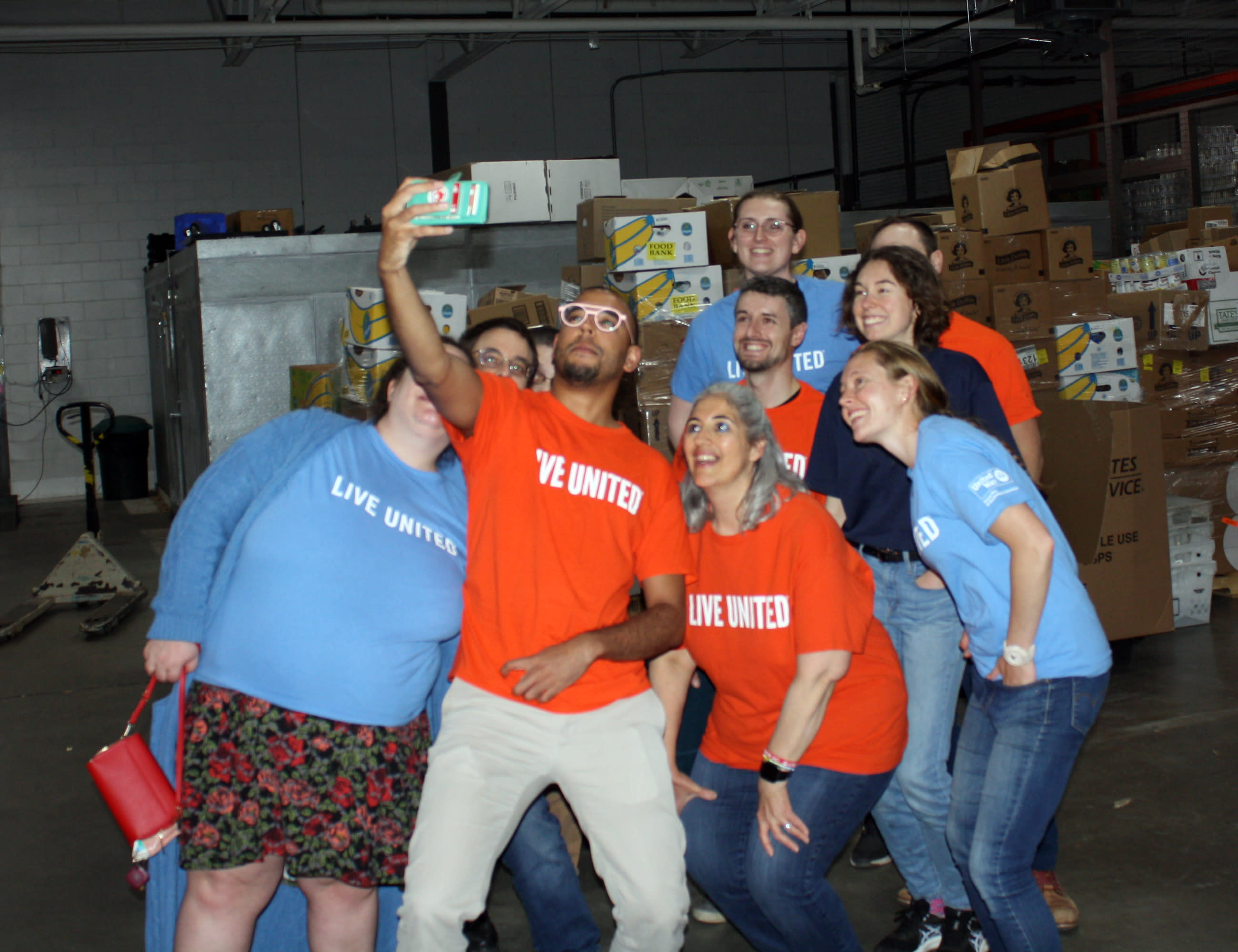 Photo of volunteers taking a selfie at the Gemma E. Moran United Way/Labor Food Center.