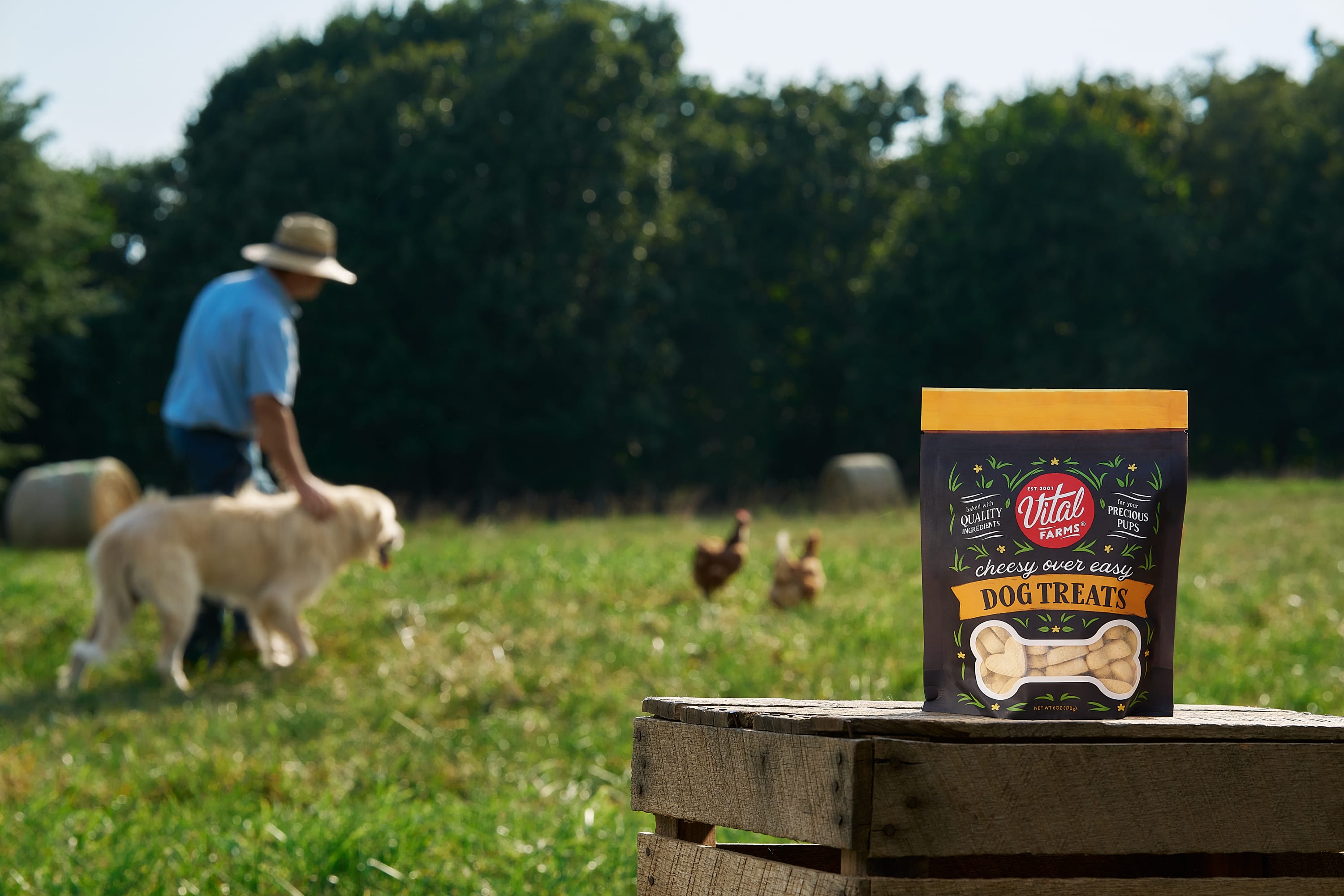 vital farms limited-edition dog treats with farmer and working dog