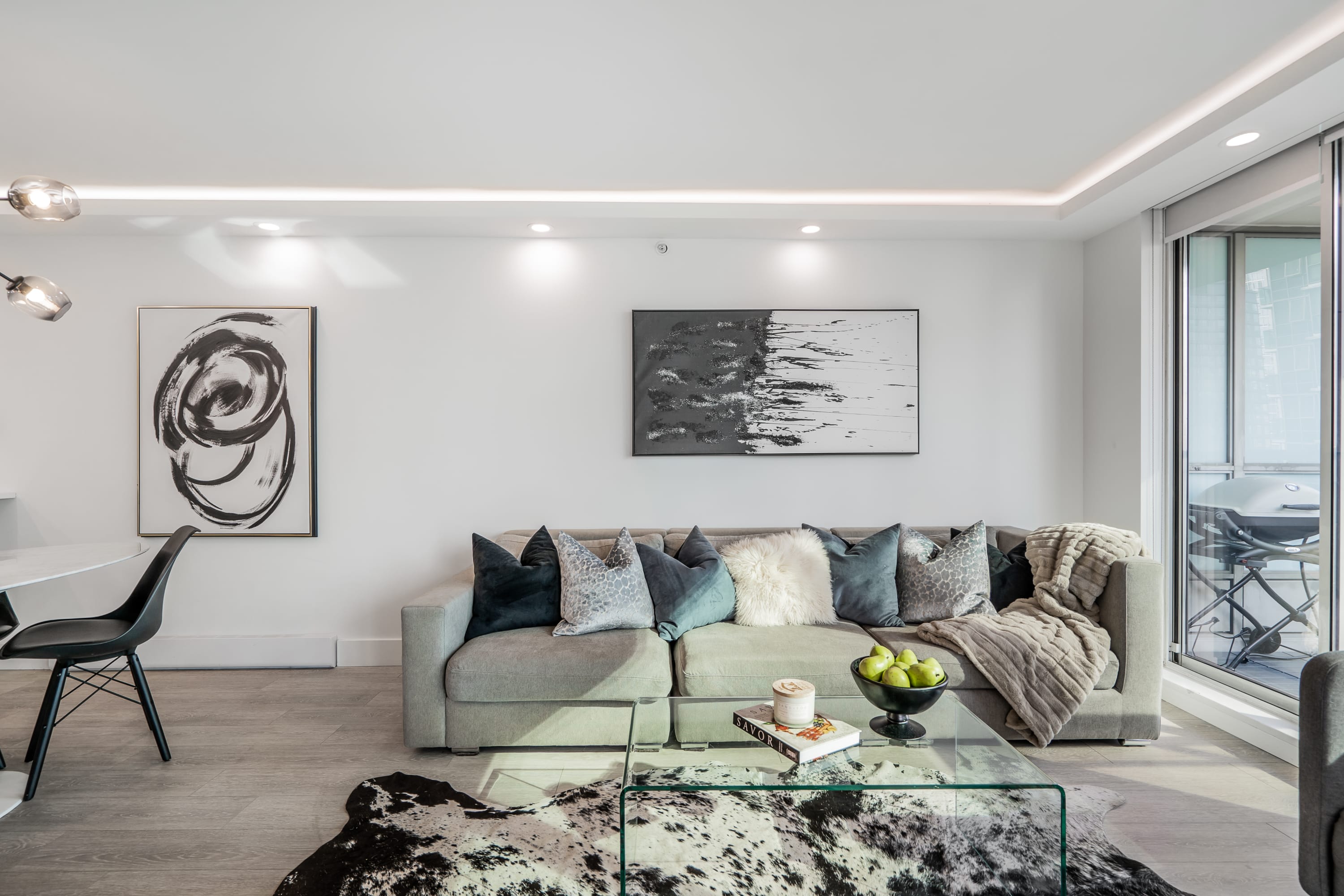 living-room-renovation-white-walls-laminate-flooring-ceiling-light-design