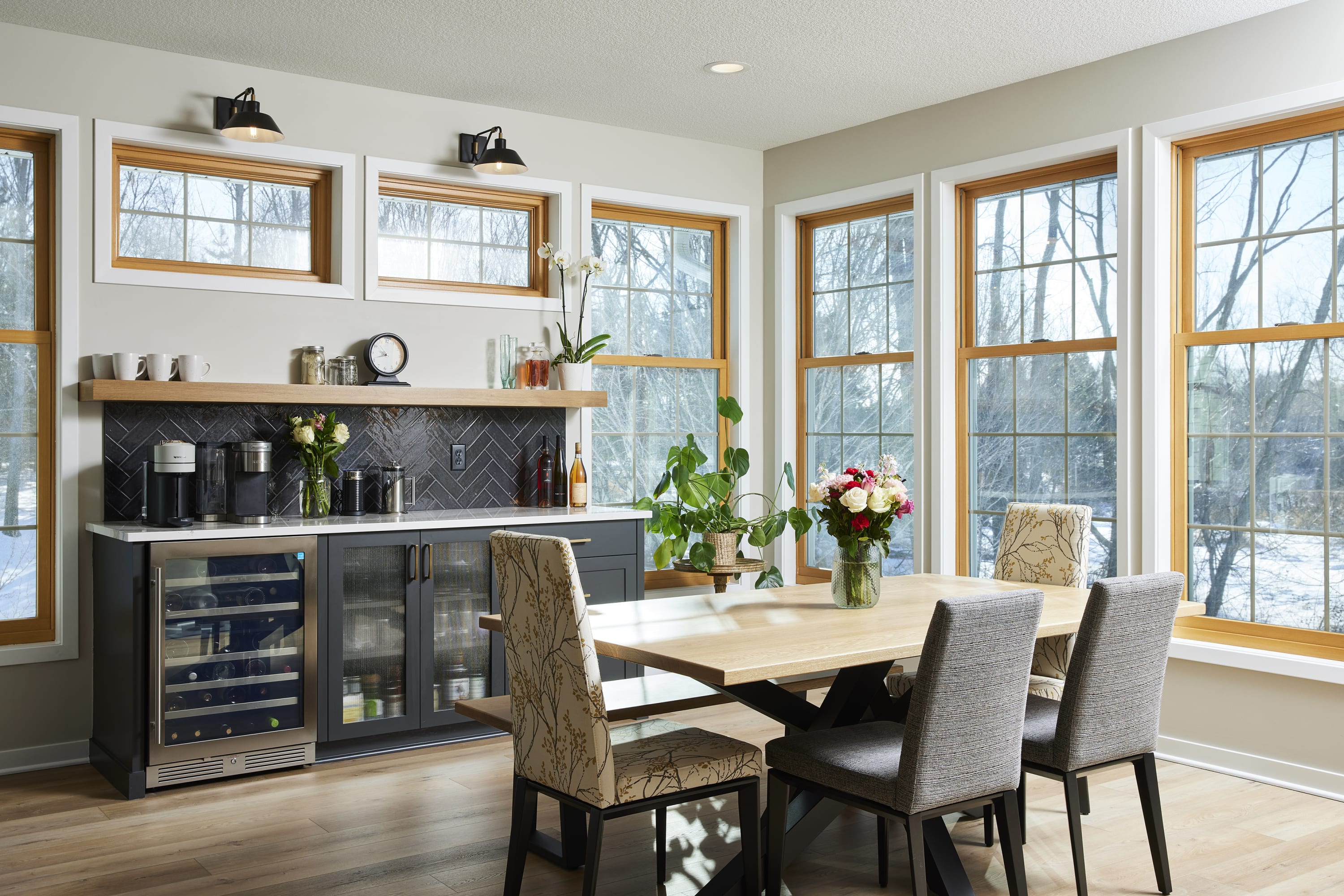 Sunroom coffee bar, windows, custom table.