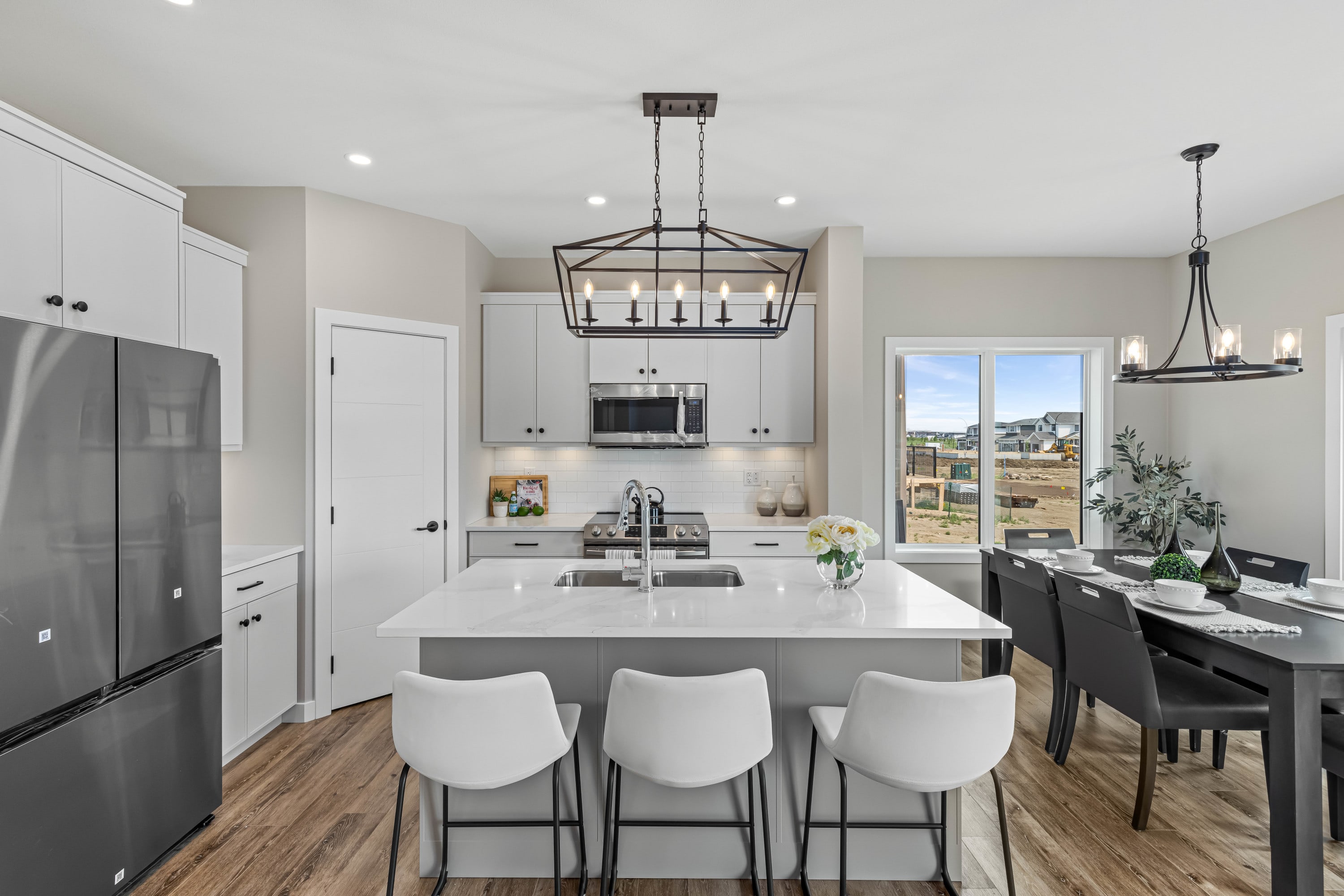 Kitchen with upgraded finishes including quartz.