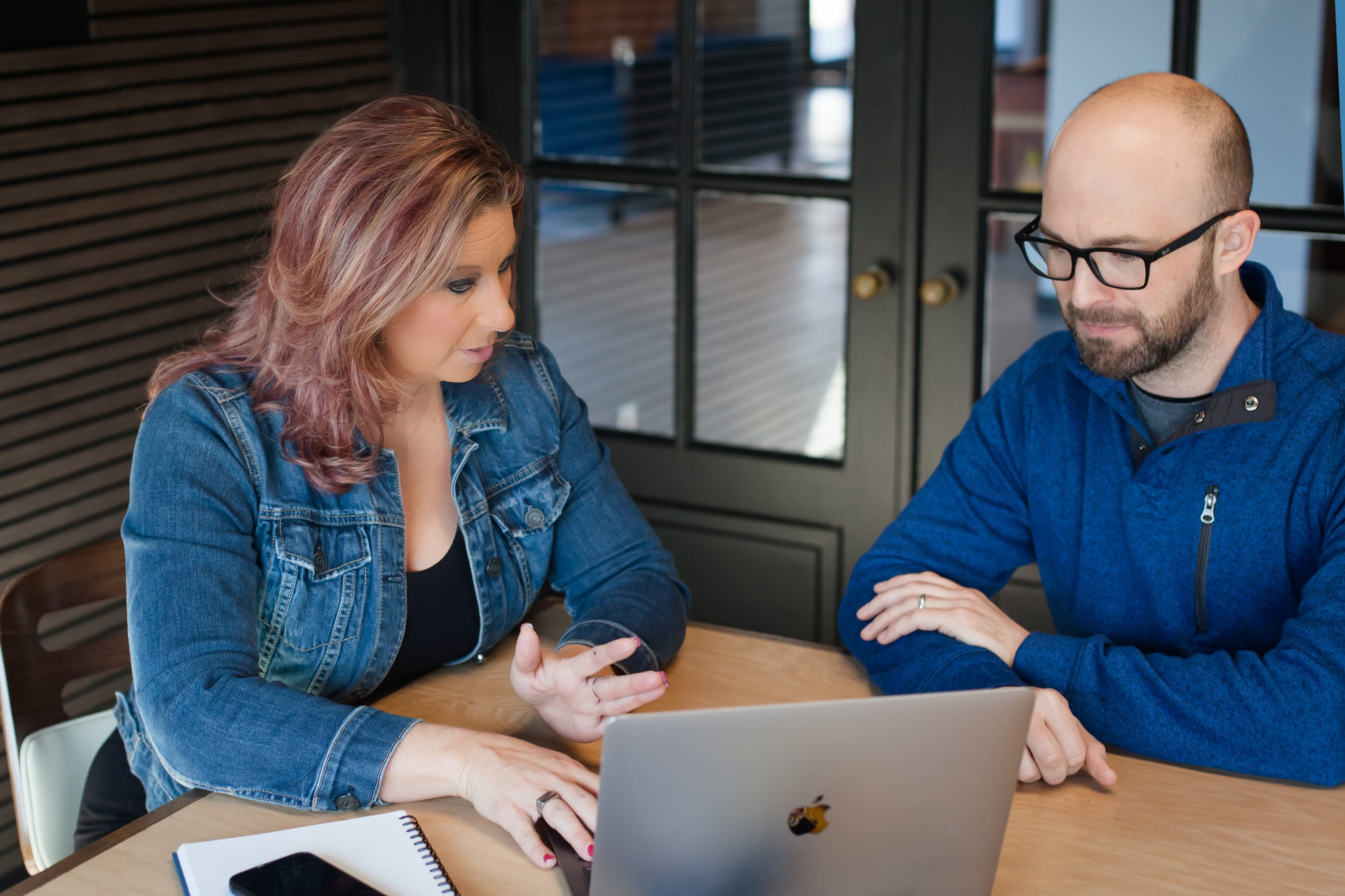 Business Consult between two people at a conference table