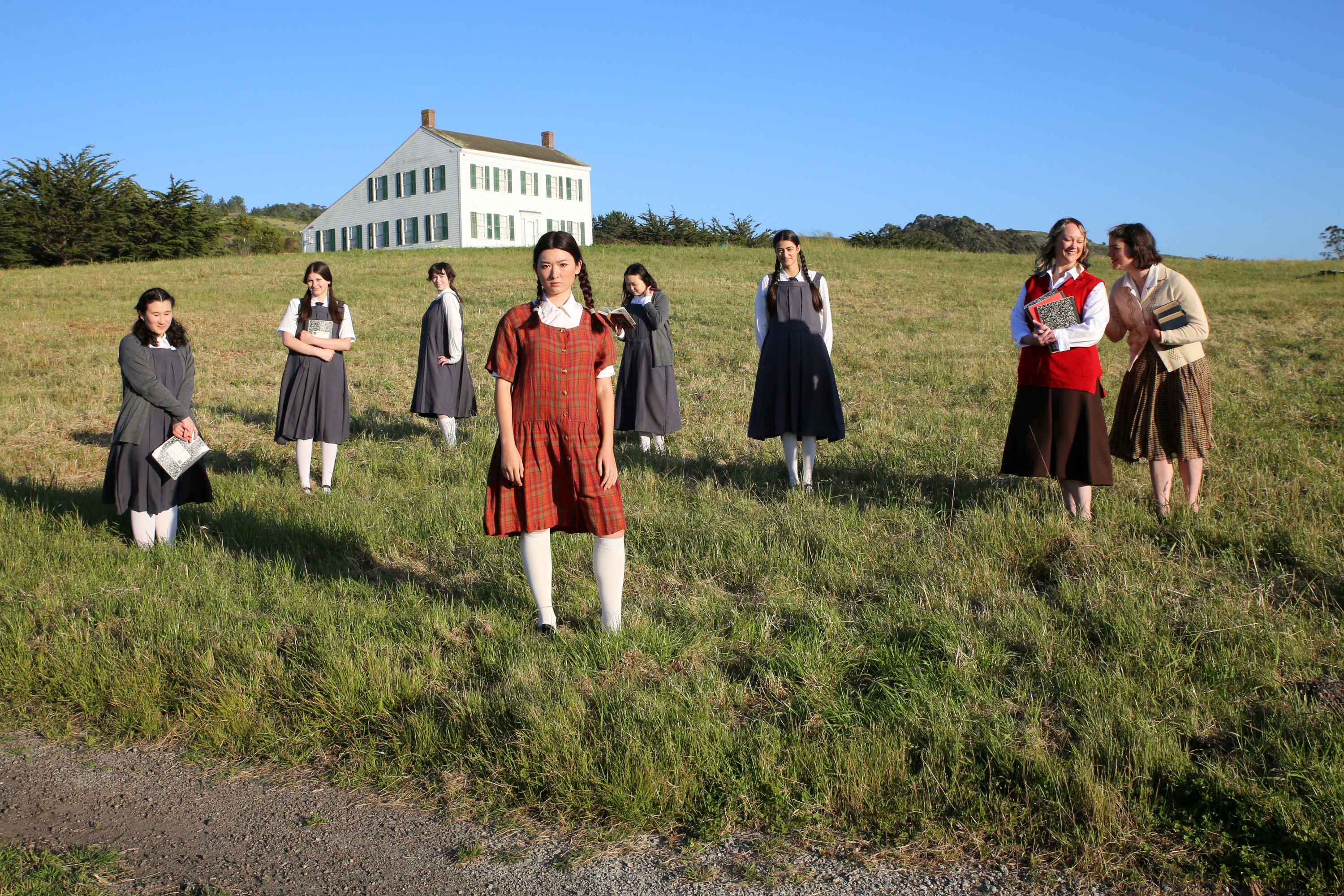8 actors in front Johnston House
