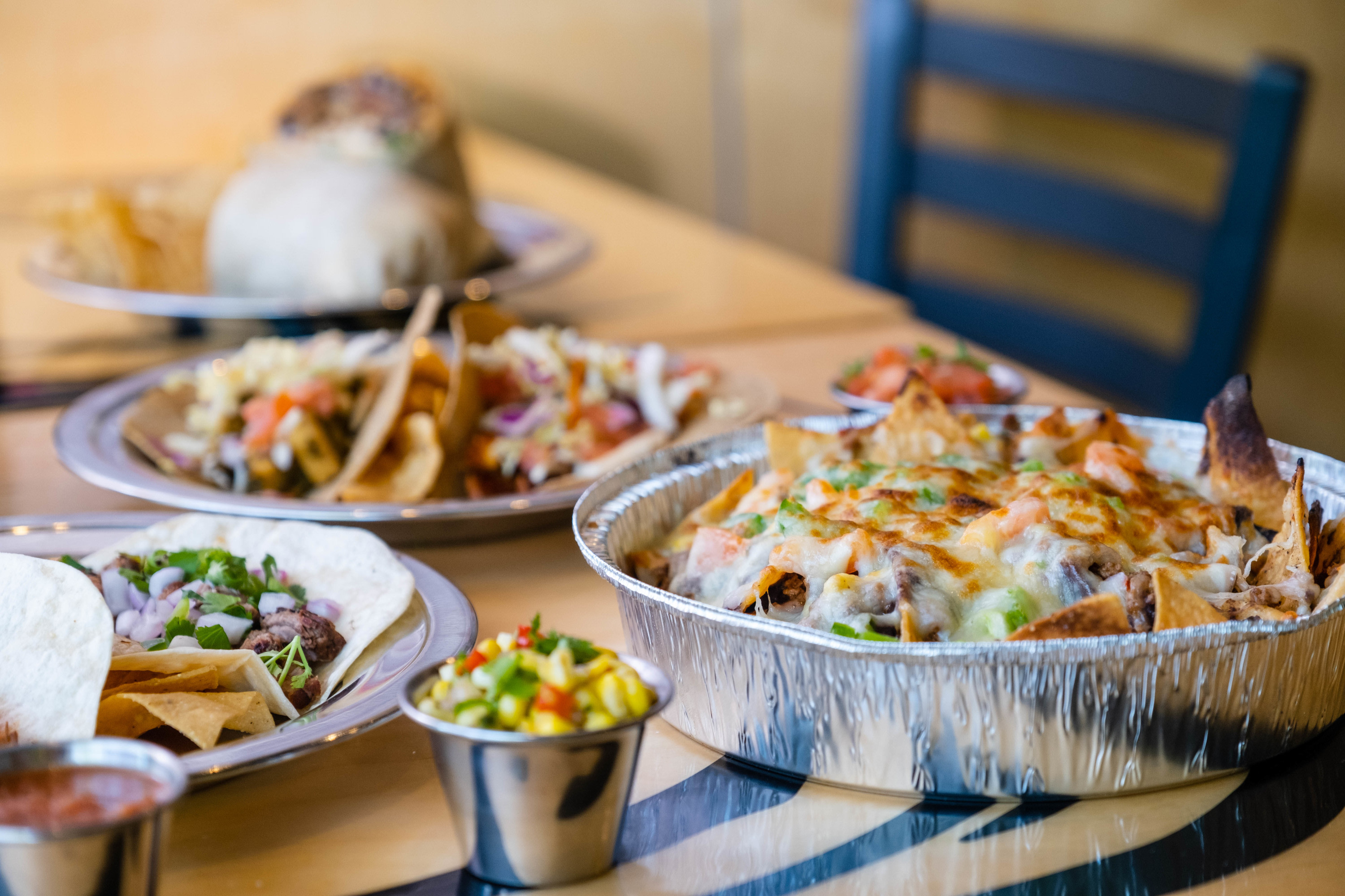 Table spread of Dos Amigos food