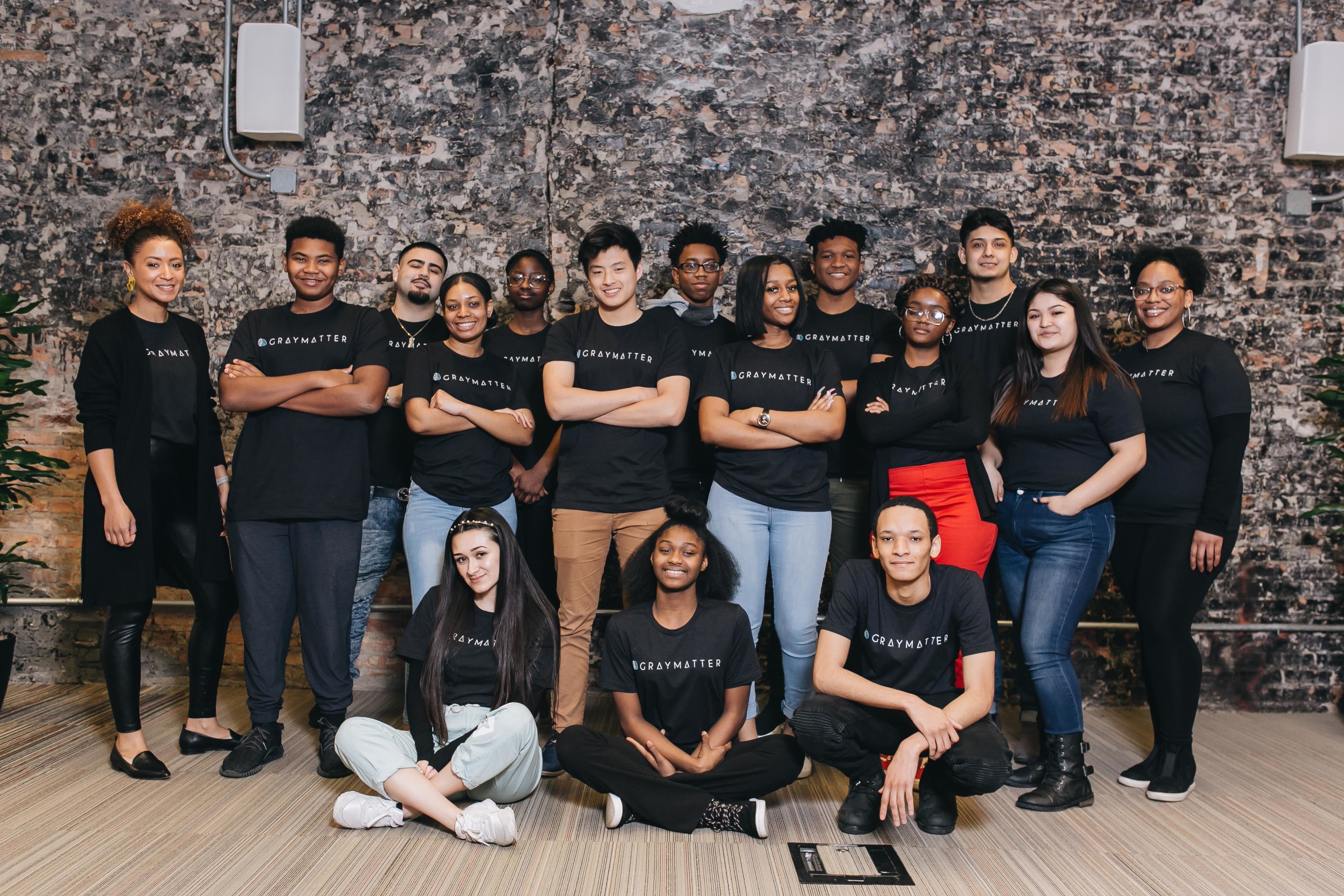 Britney Robbins and team in Gray Matter Experience T-shirts