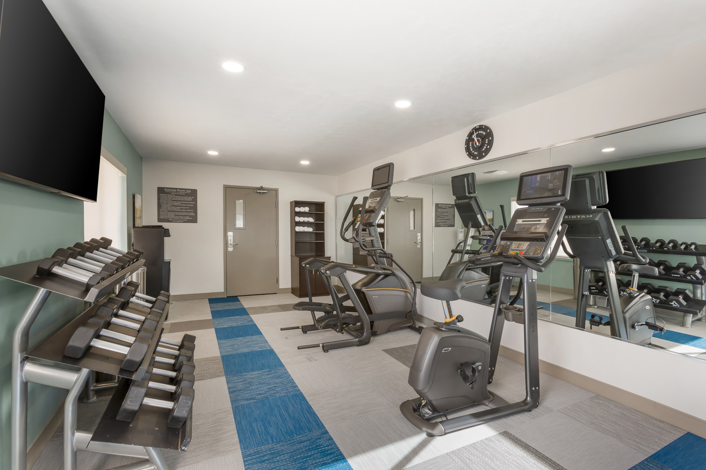 Fitness center at Comfort Suites Tucson Mall with exercise equipment.