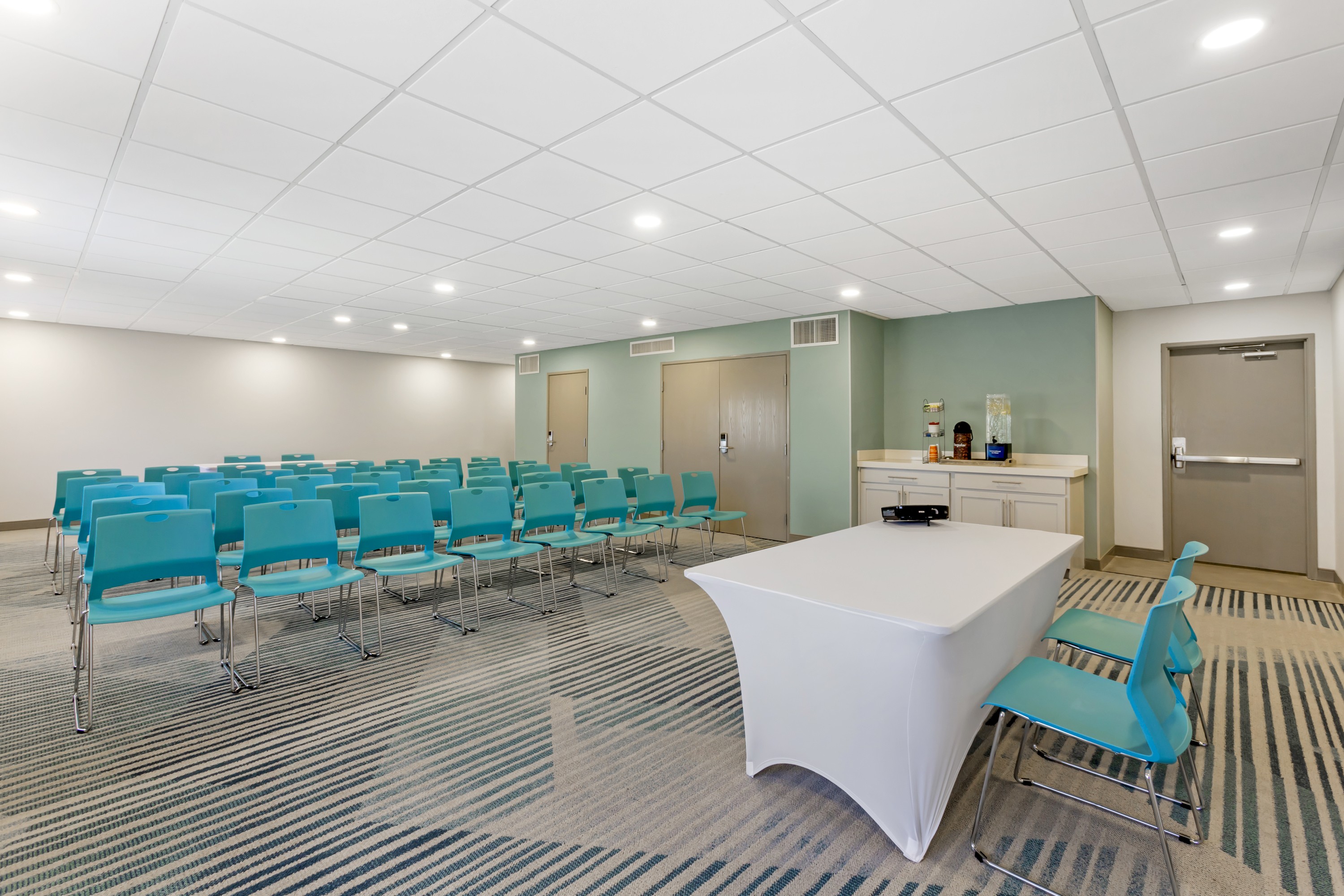 Meeting room at Comfort Suites Tucson Mall with conference table and chairs.