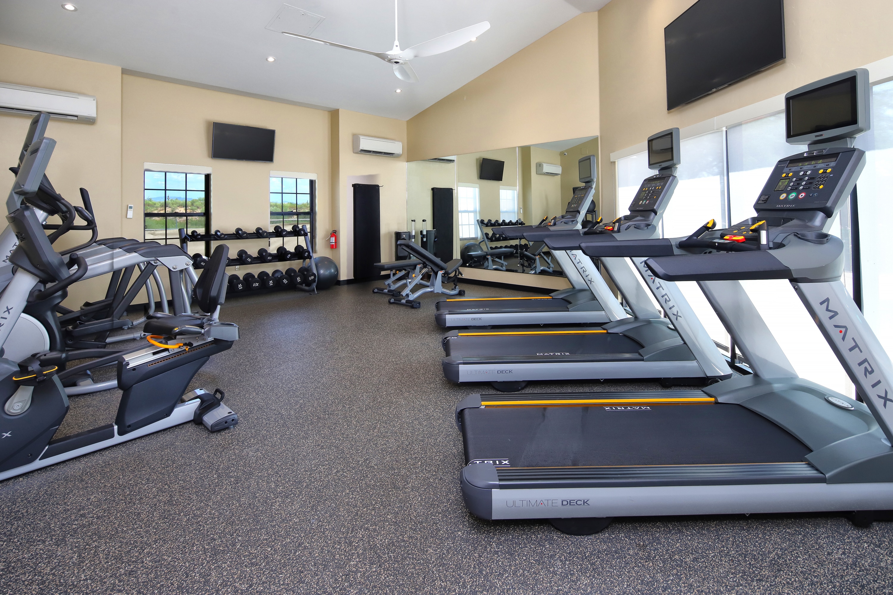 TownePlace Suites Tucson fitness center with cardio equipment and weight machines