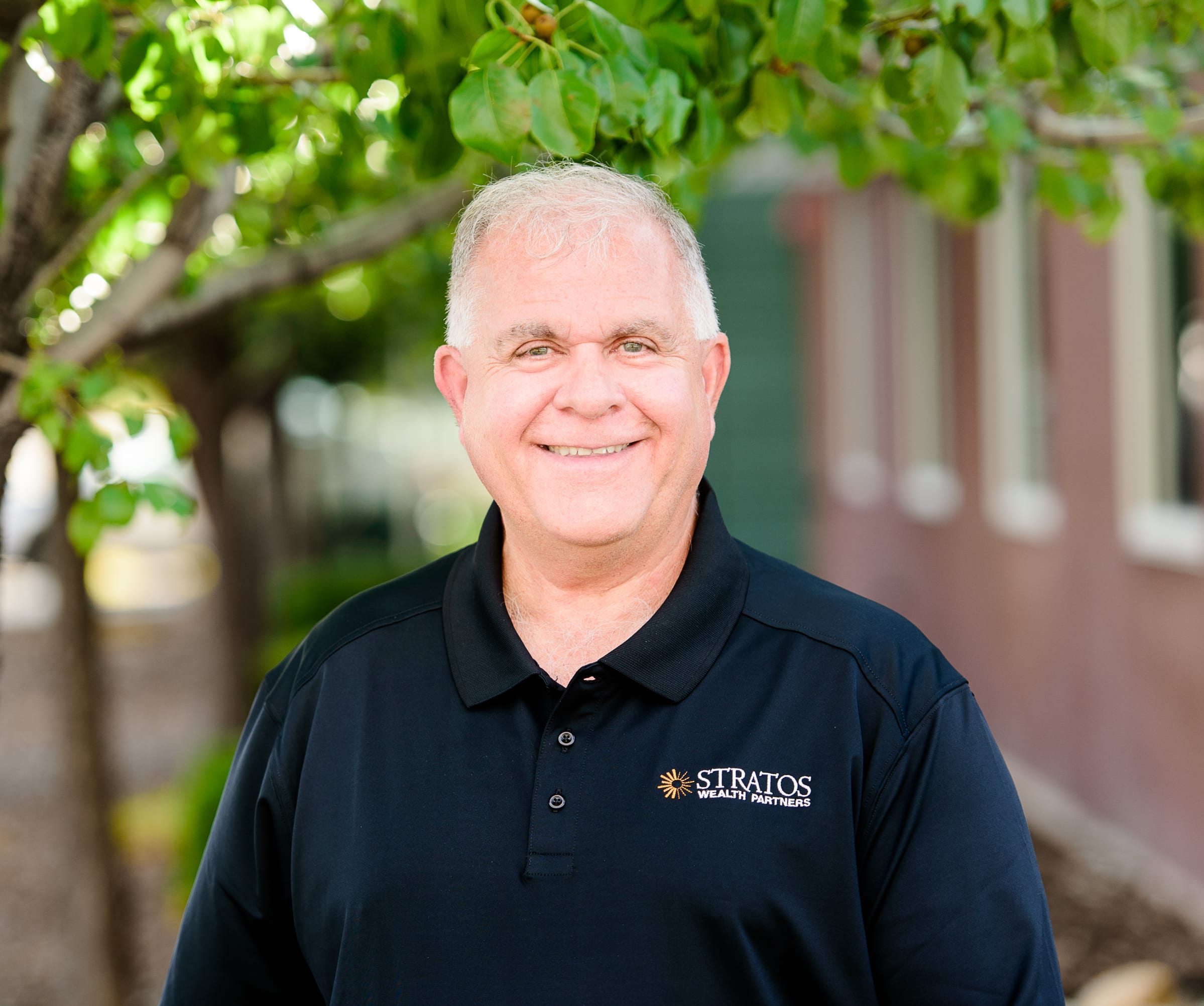 A picture of Craig Adams, CFP in a Stratos shirt