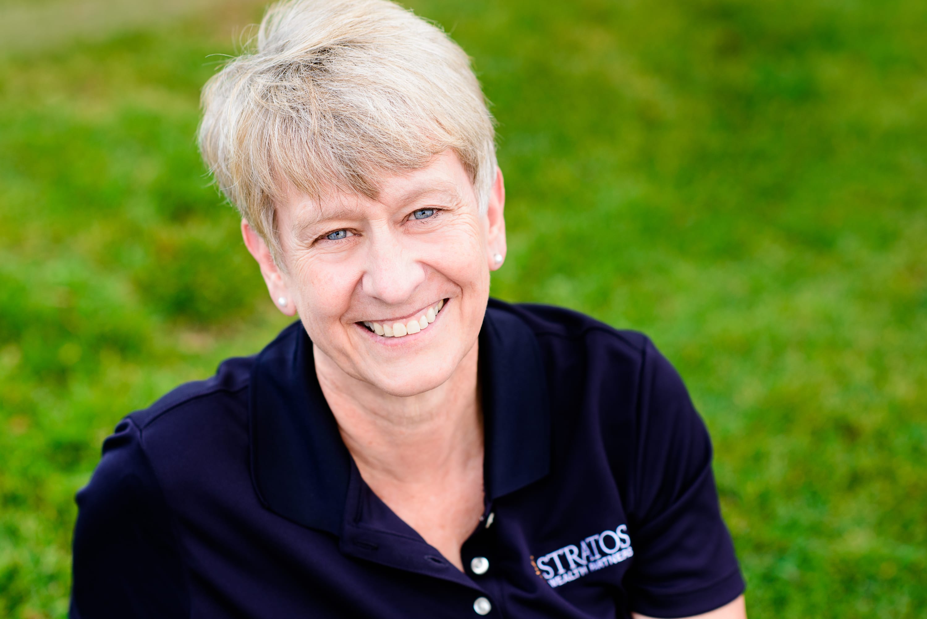 A picture of Julie Carpenter in a Stratos shirt.