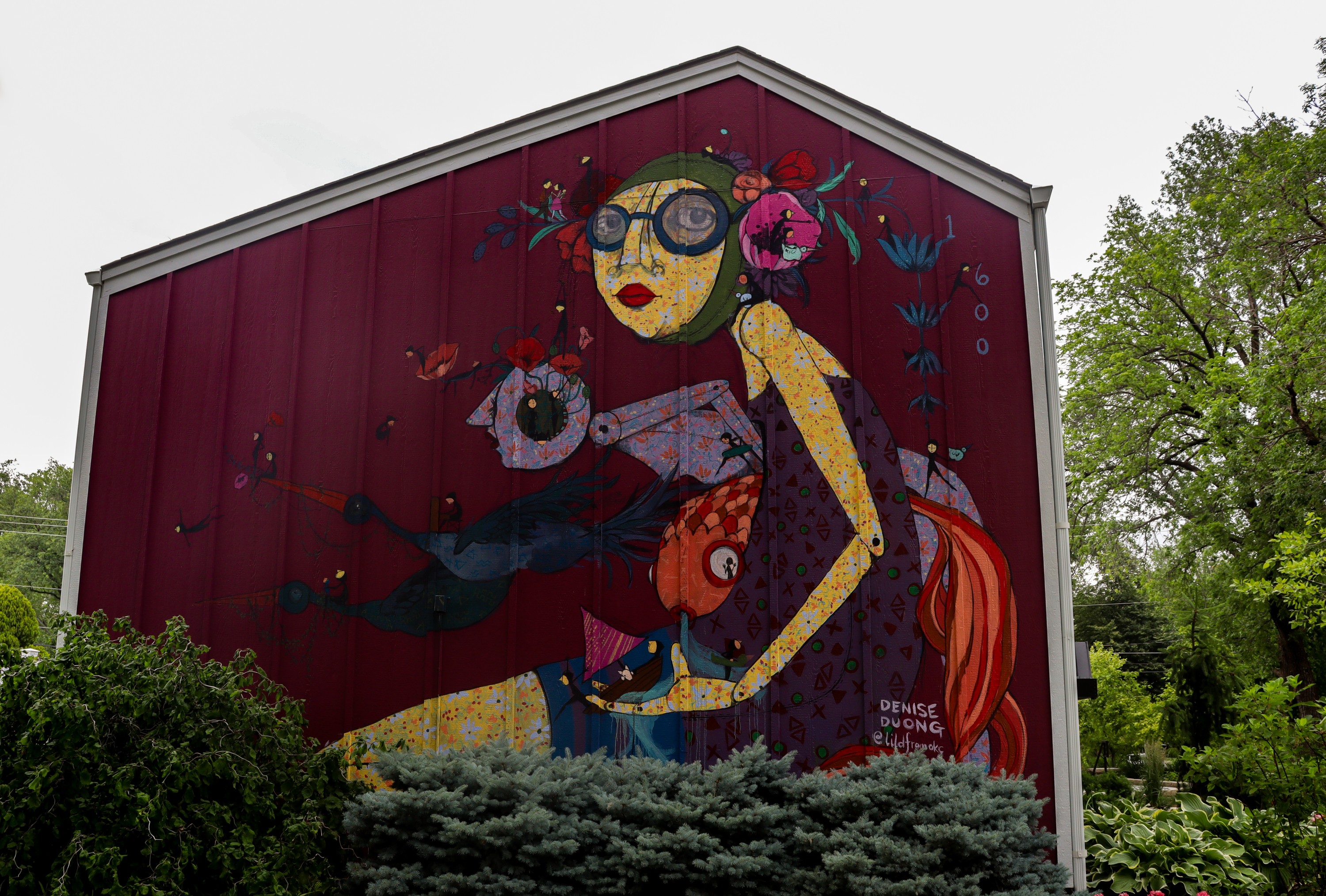 beautiful mural by Denise Duong on Addair Law's building