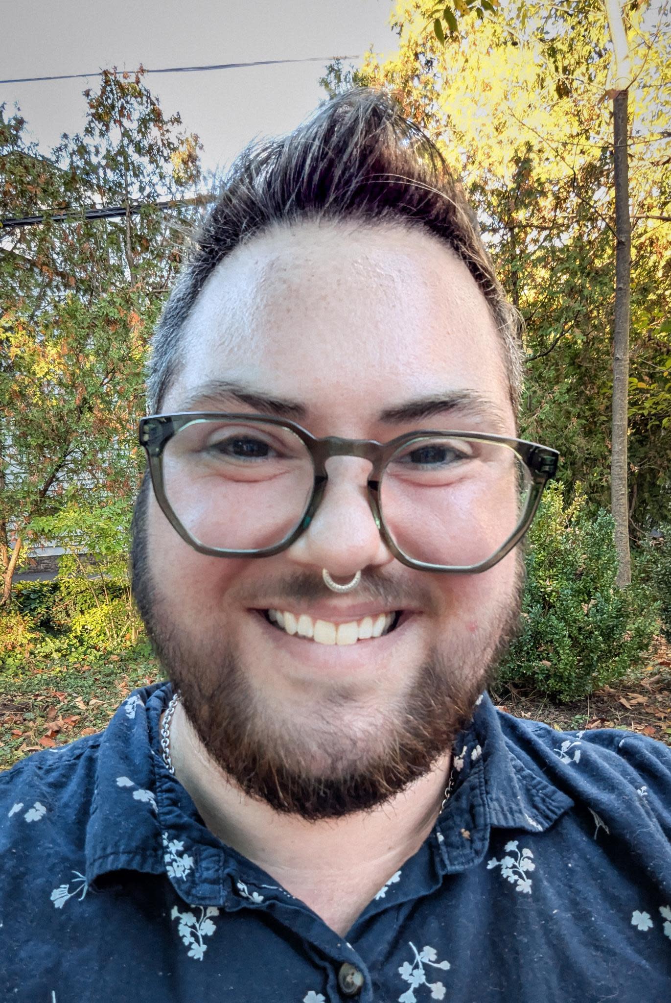 Rowan smiling in his back yard