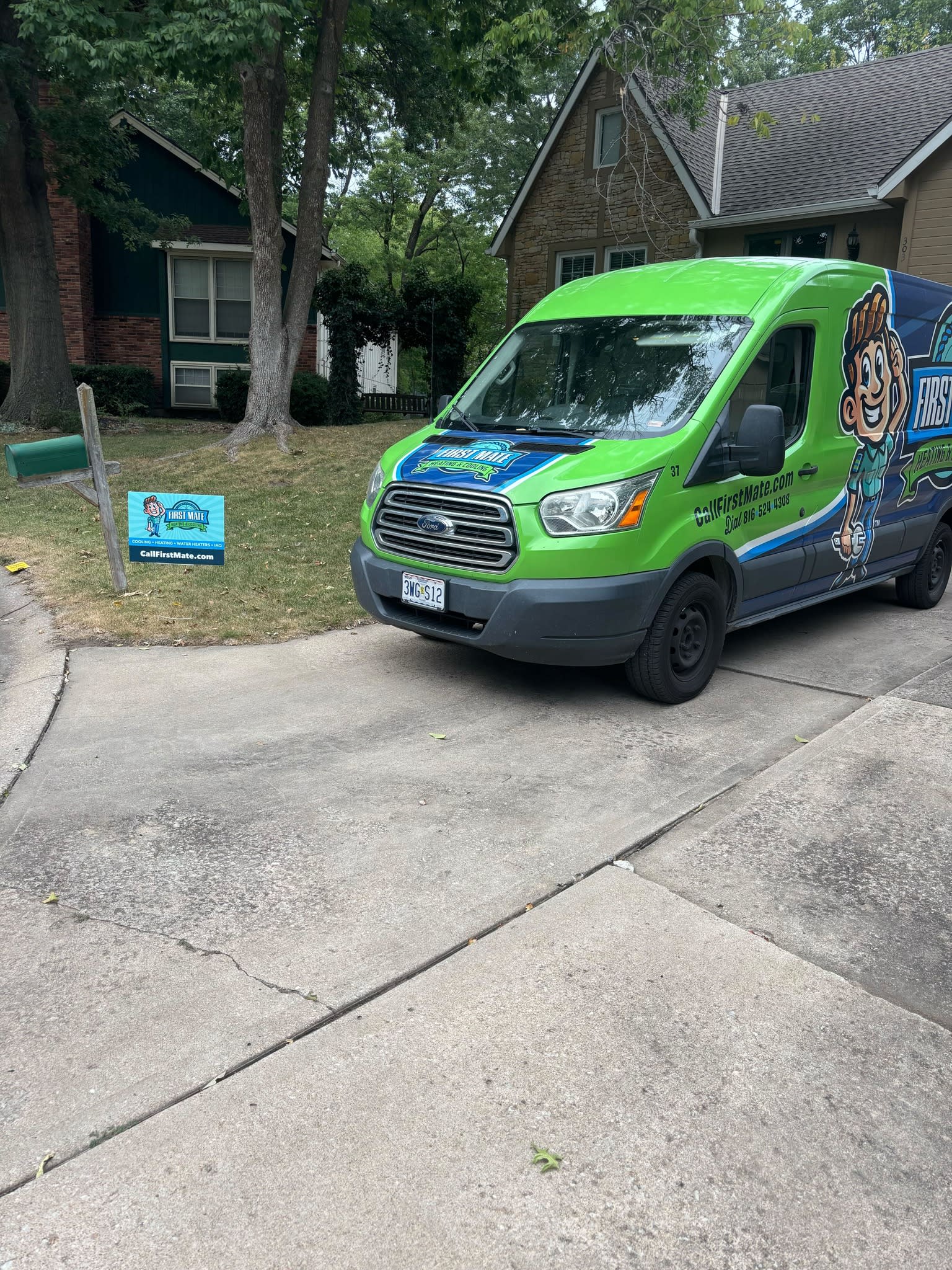 First Mate Heating & Cooling HVAC service van outside Leawood home