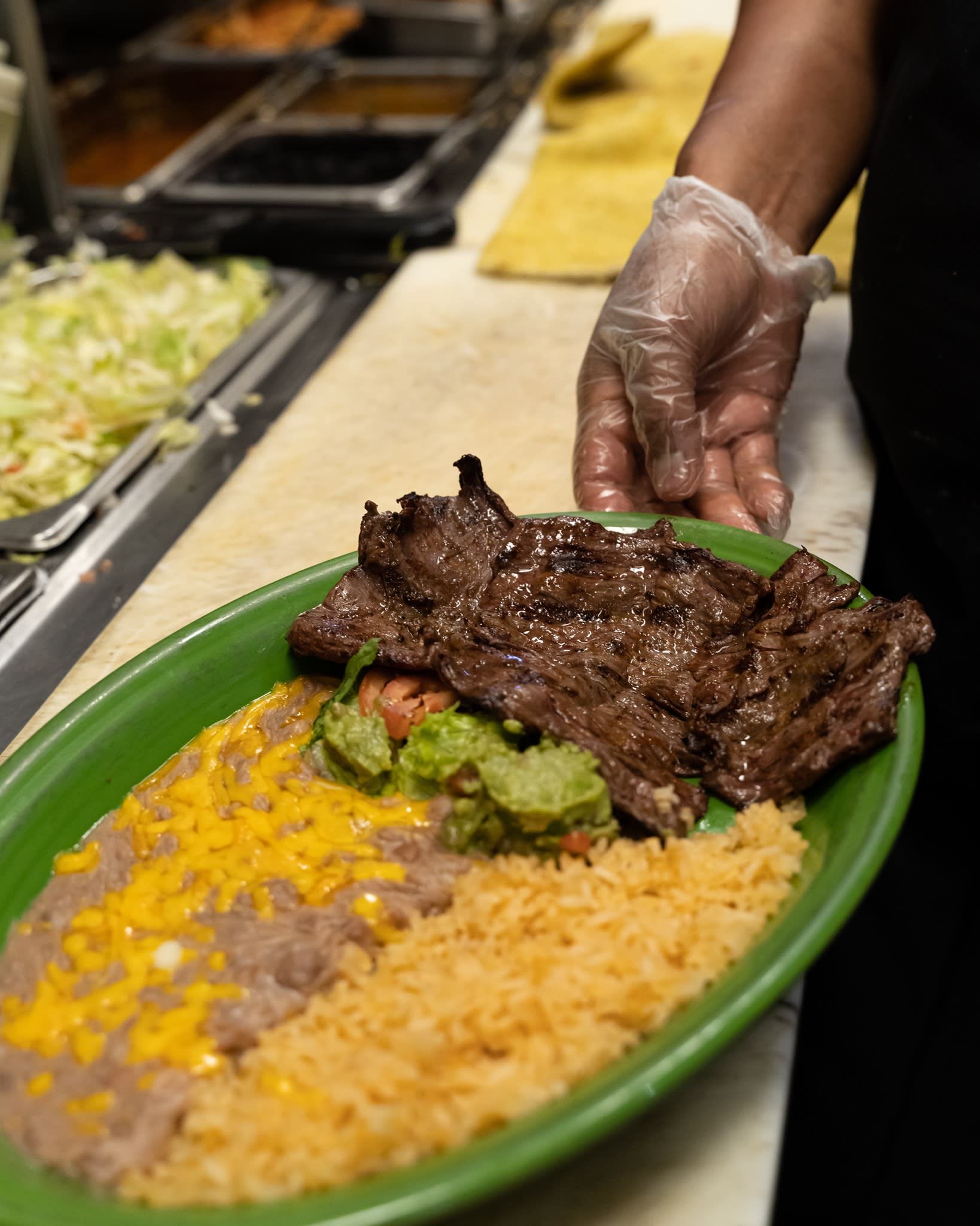 Steak, beans and rice meal