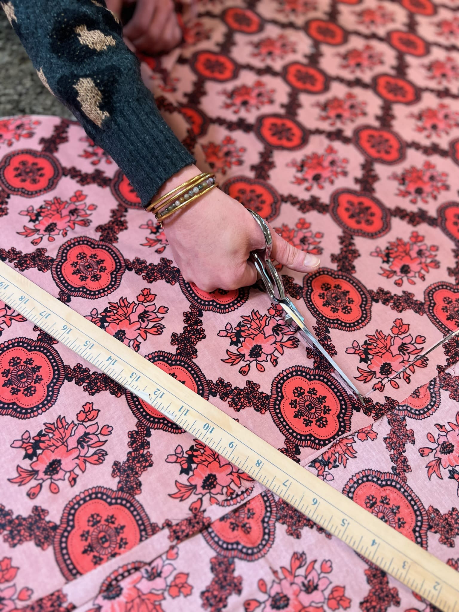 Pink fabric being Cut