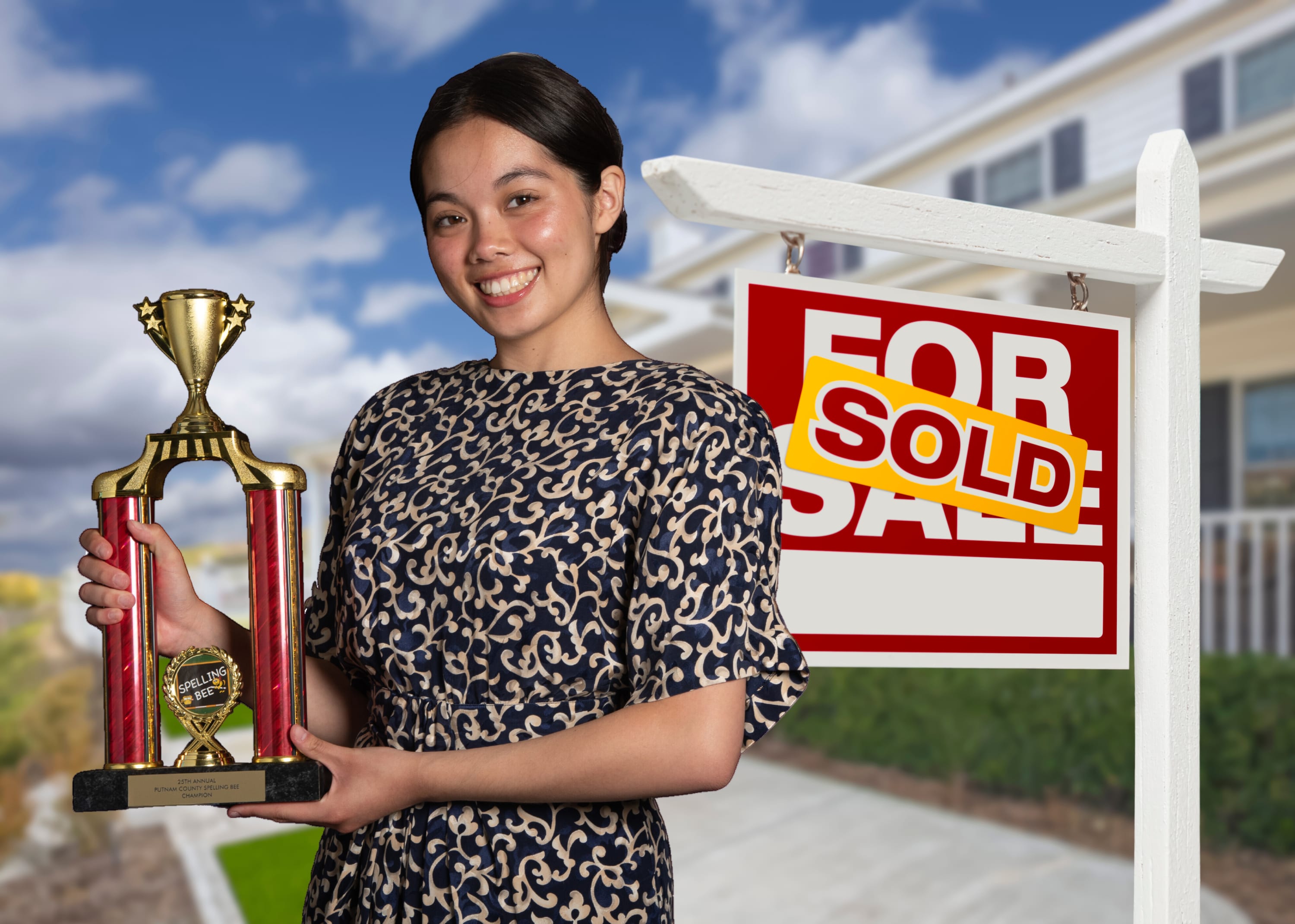 Rona Lisa Peretti, a realtor and character in the show, standing in front of a house with a "for sale - sold" sign to her rig