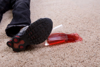 red juice spill on carpet