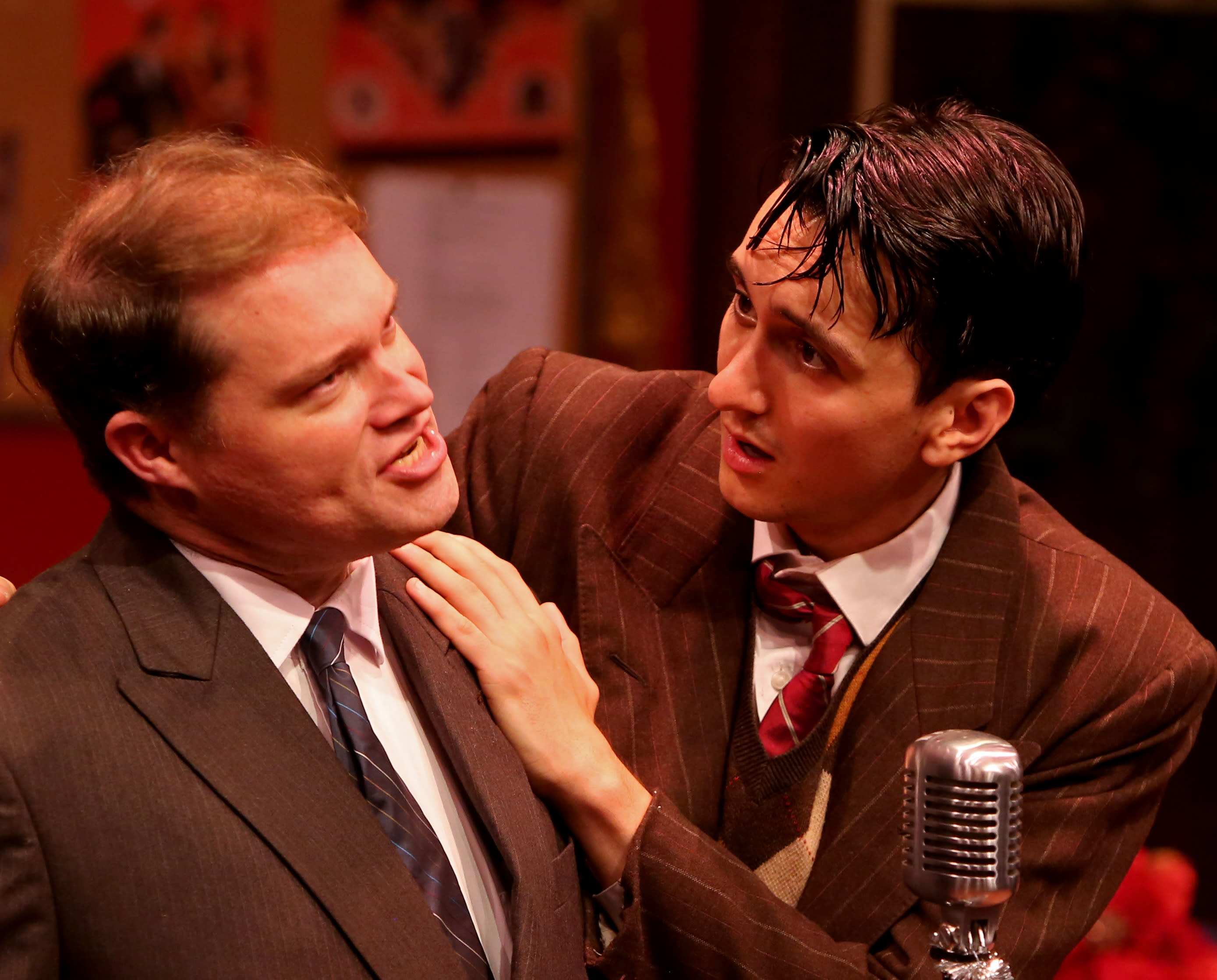 two actors at a microphone