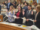 Photo of new admittees being sworn in,
