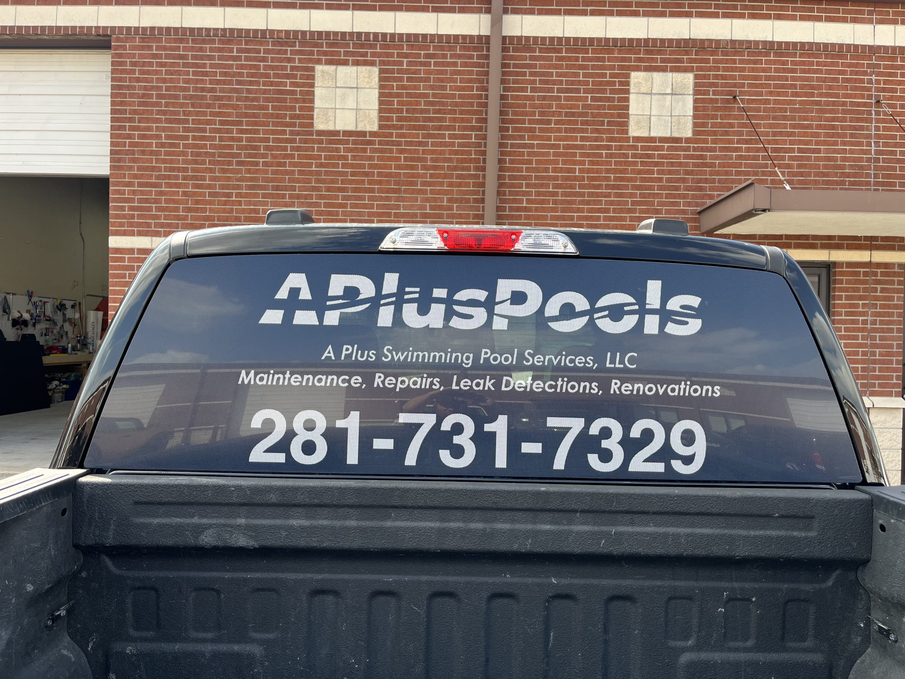 A Plus Pools Rear Window Vinyl produced by Vital Sign Solutions