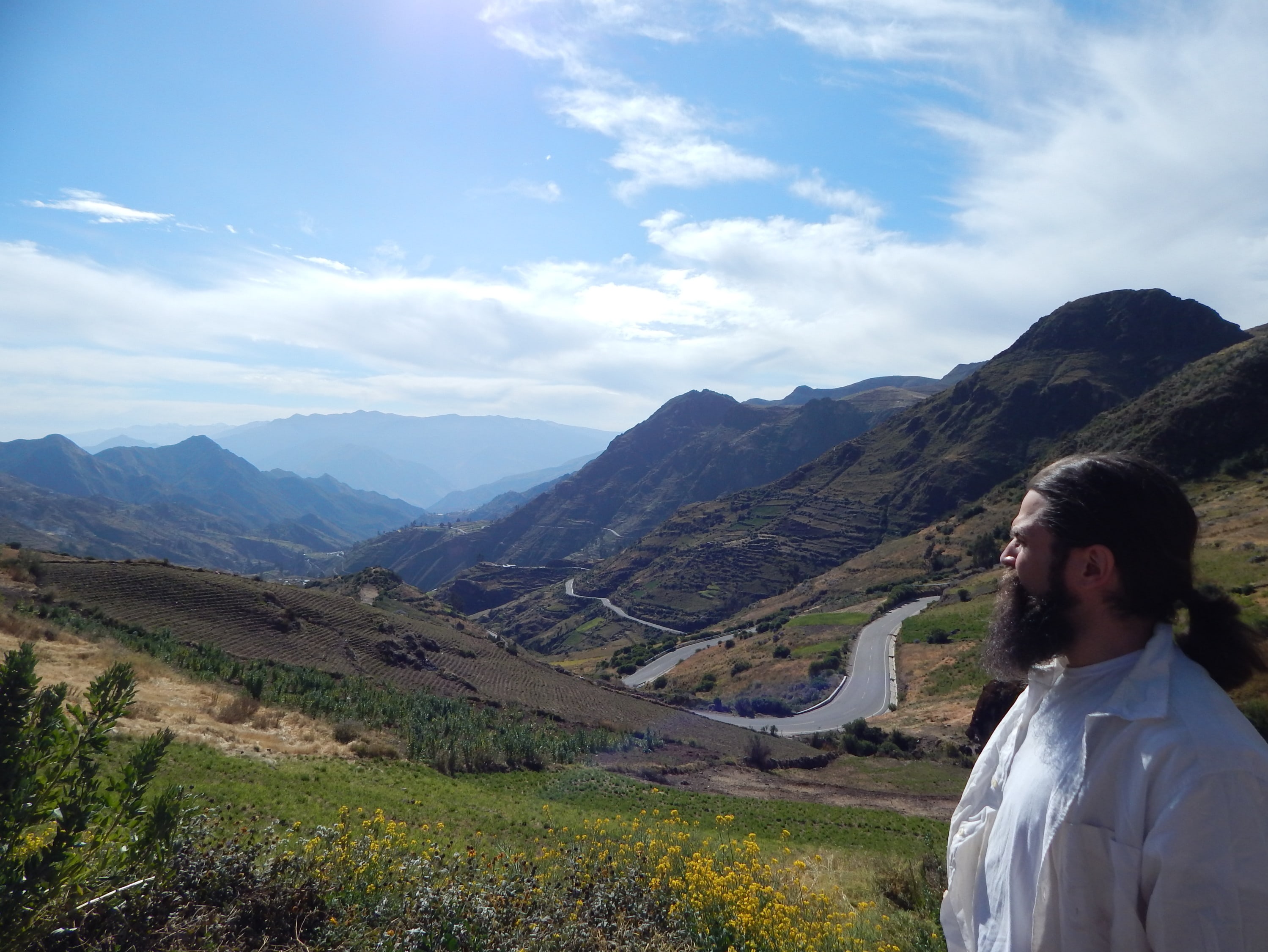 Kirk Costion, Ph.D. overlooking landscape in Peru