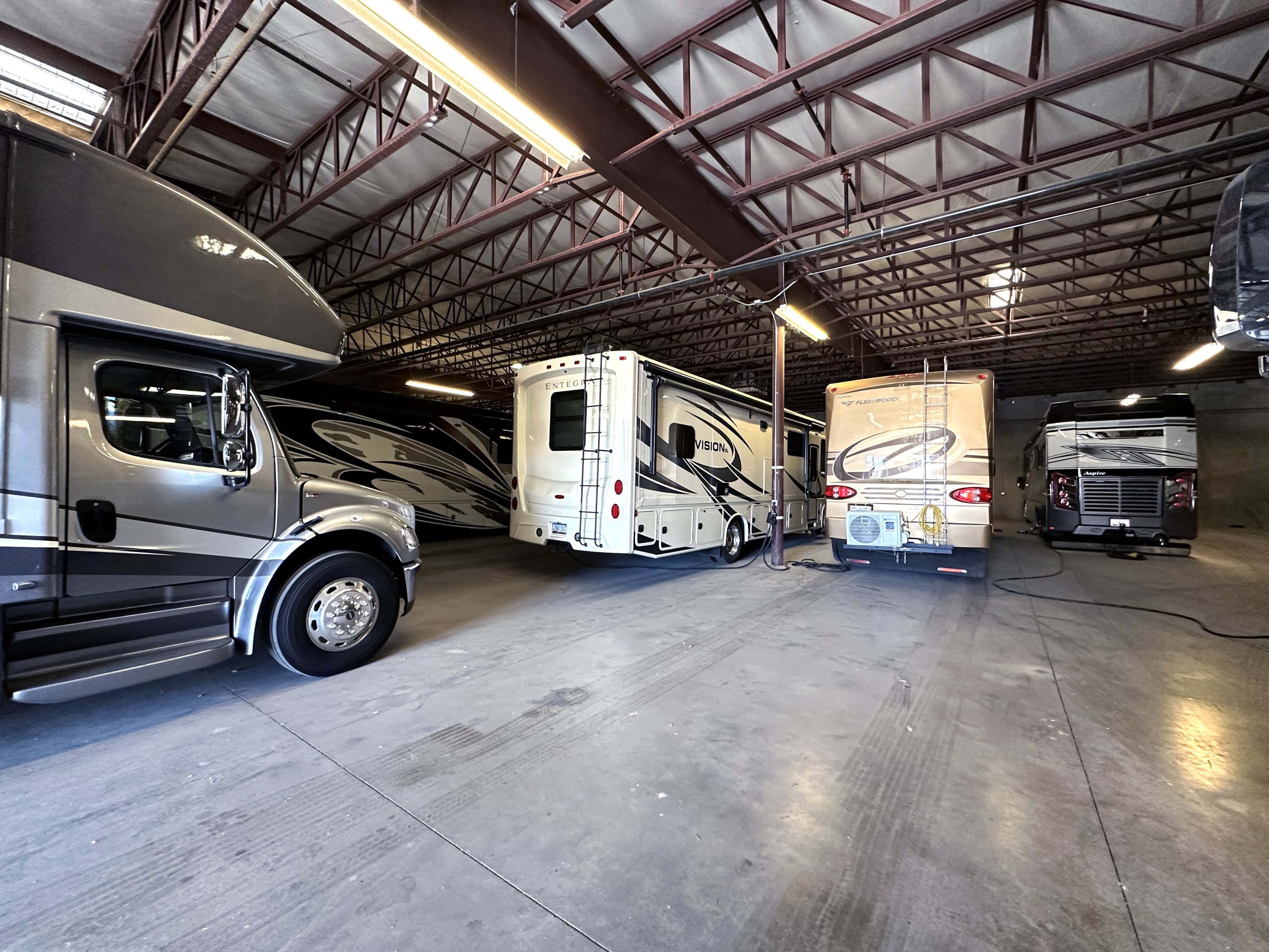 RVs stored in a warehouse