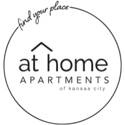 At Home Apartments logo
