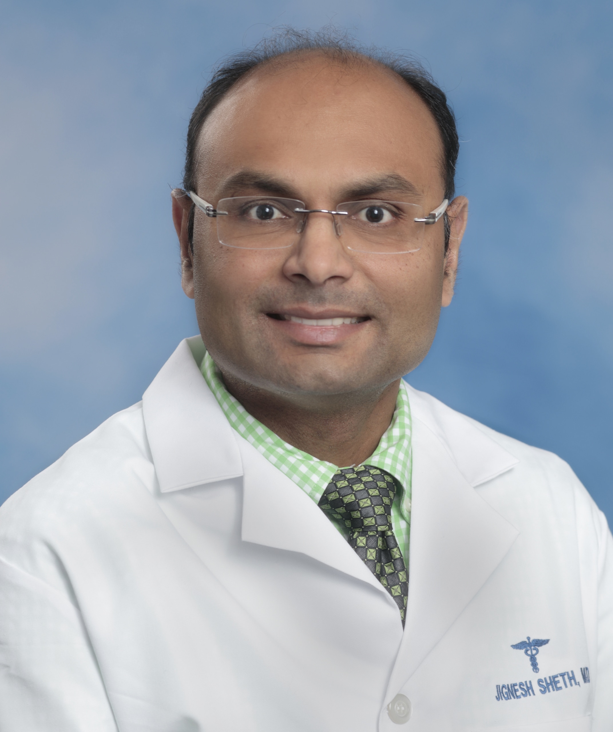 Dr. Jignesh Y. Sheth