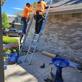 Cenco employees examining a roof