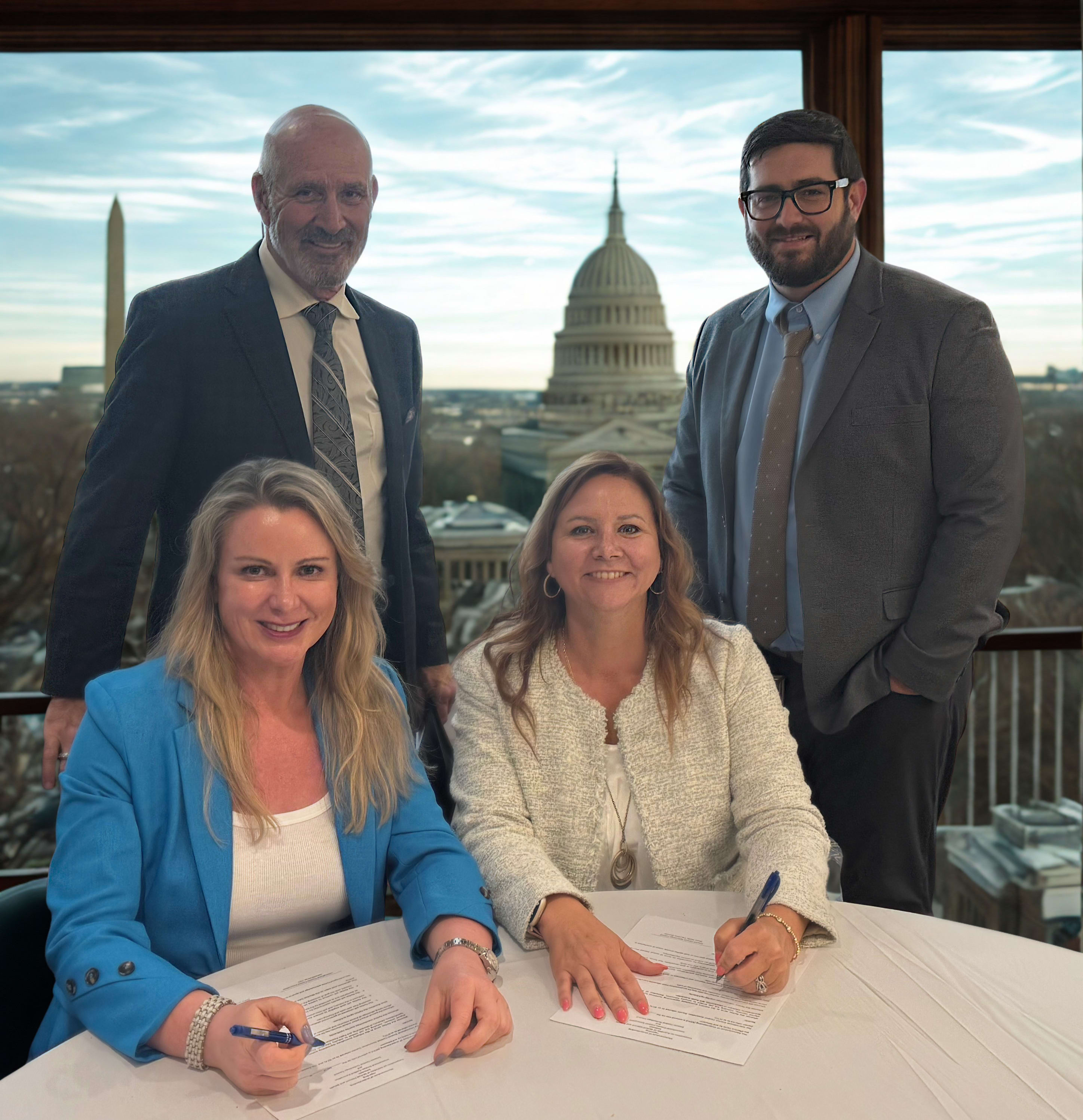 Front row, left to right: Samantha Roe, CEO IECA; Diane Smith, Executive Director ECTC. Back row, left to right: Jerry Sander