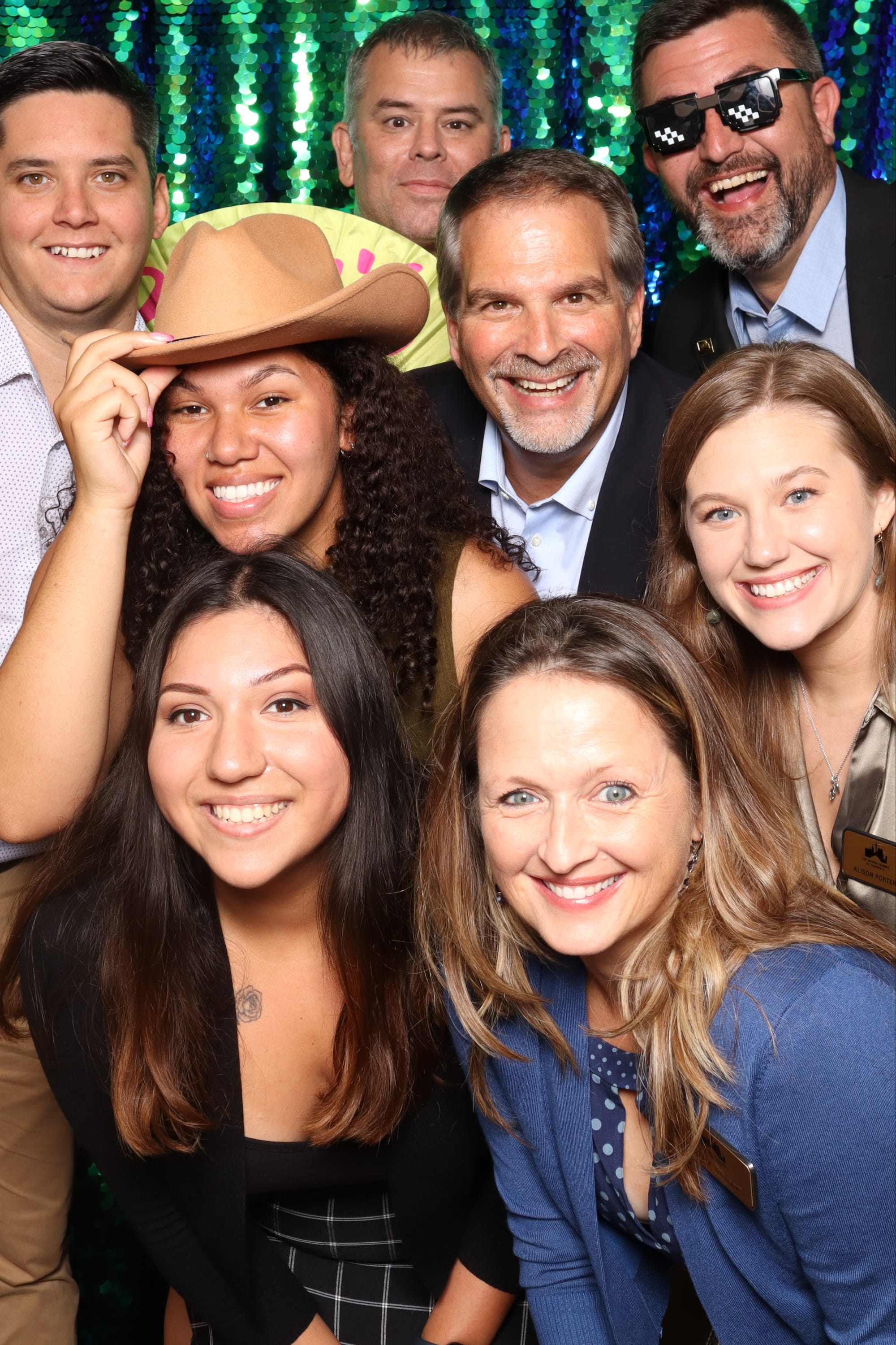 team taking photos with Little Lemon Shots Photo Booth