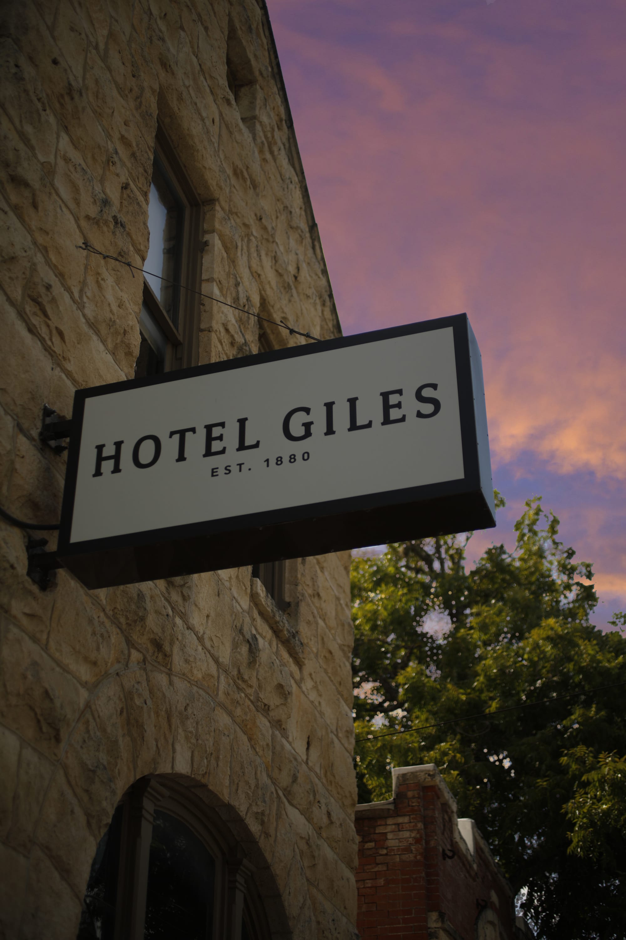 Hote Giles sign at sunset
