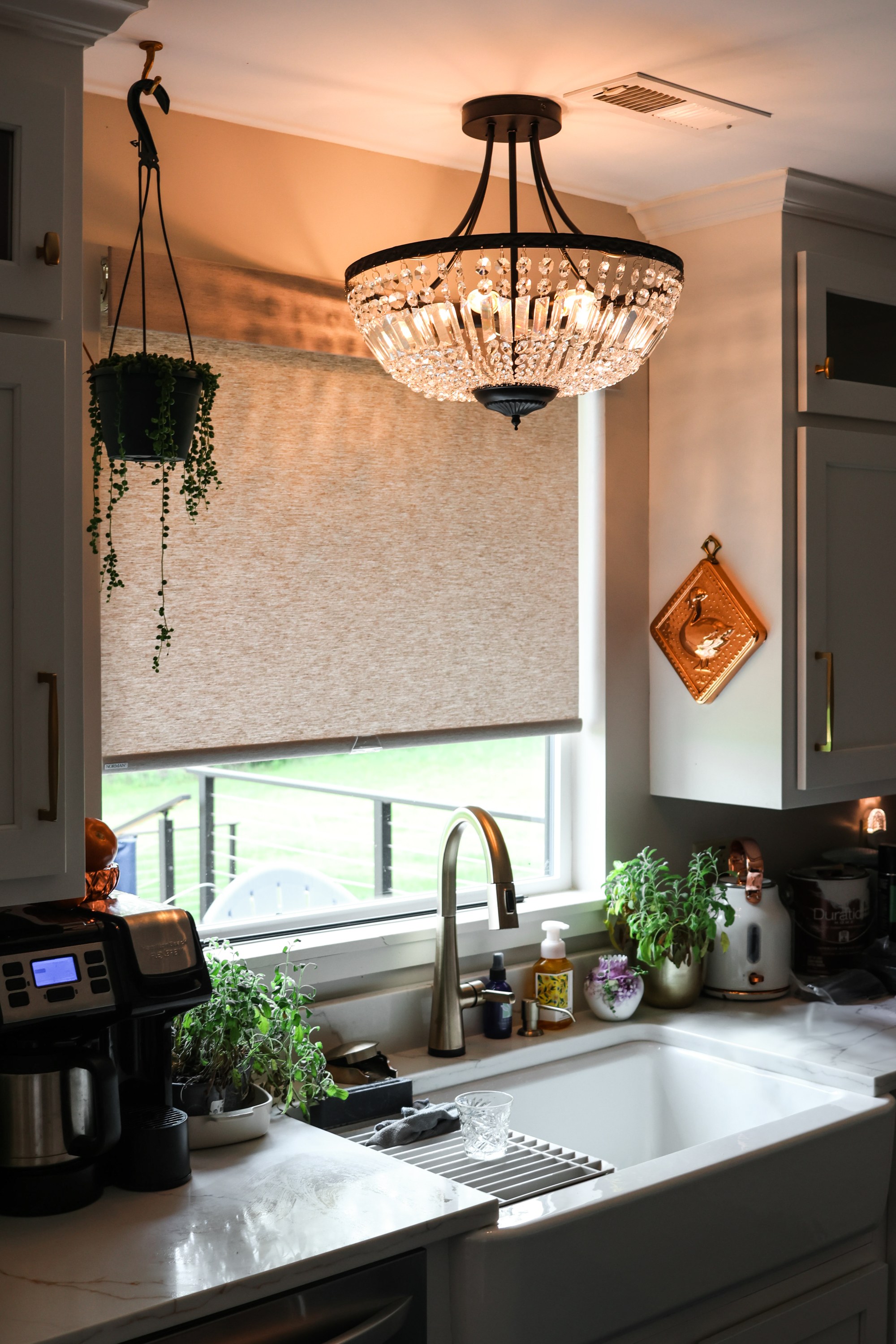 motorized roller shade in kitchen window