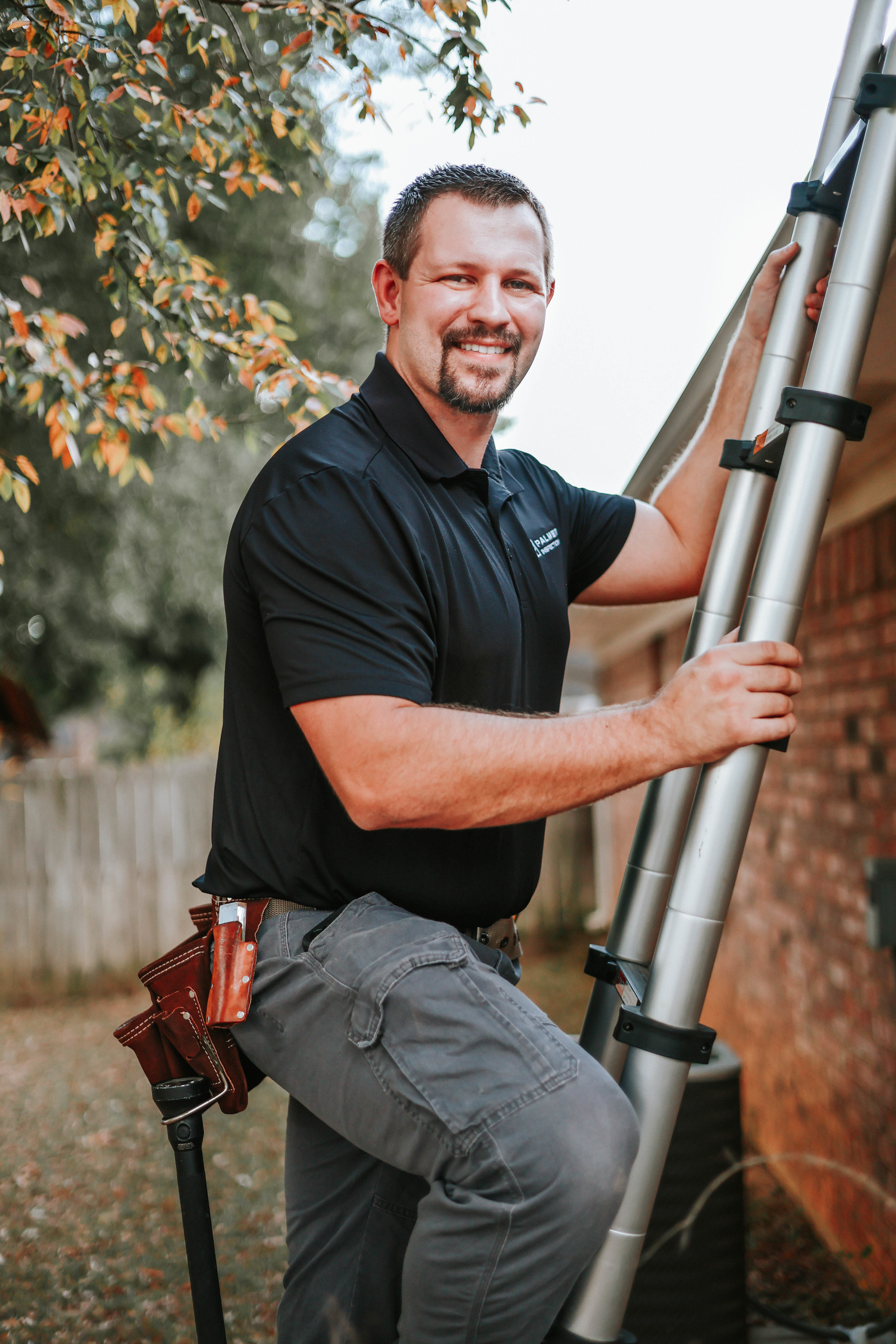 Palmer Inspections home inspector in Longview TX performing roof inspection with ladder, serving East Texas buyers and seller