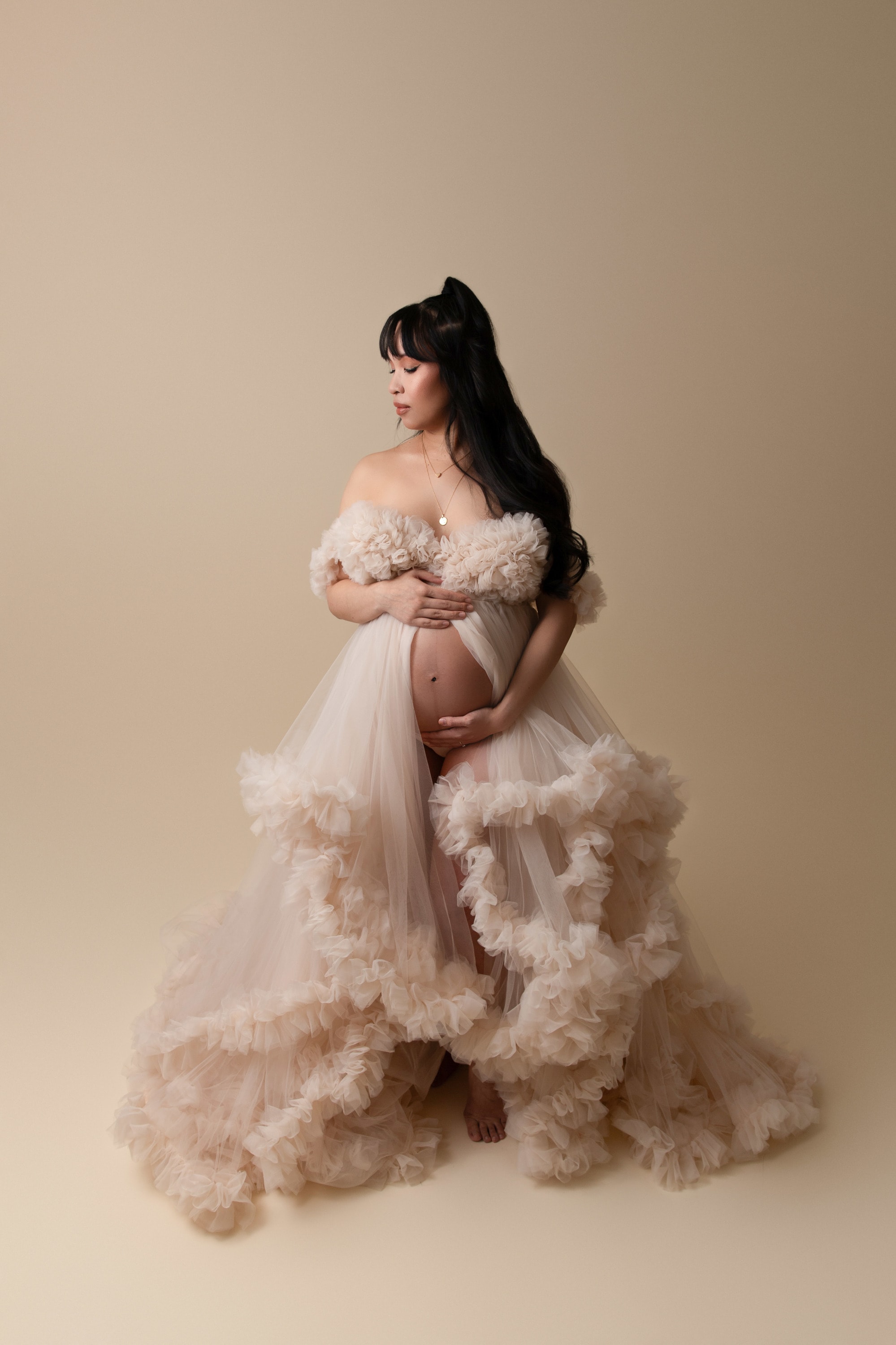 pregnant woman in a maternity gown