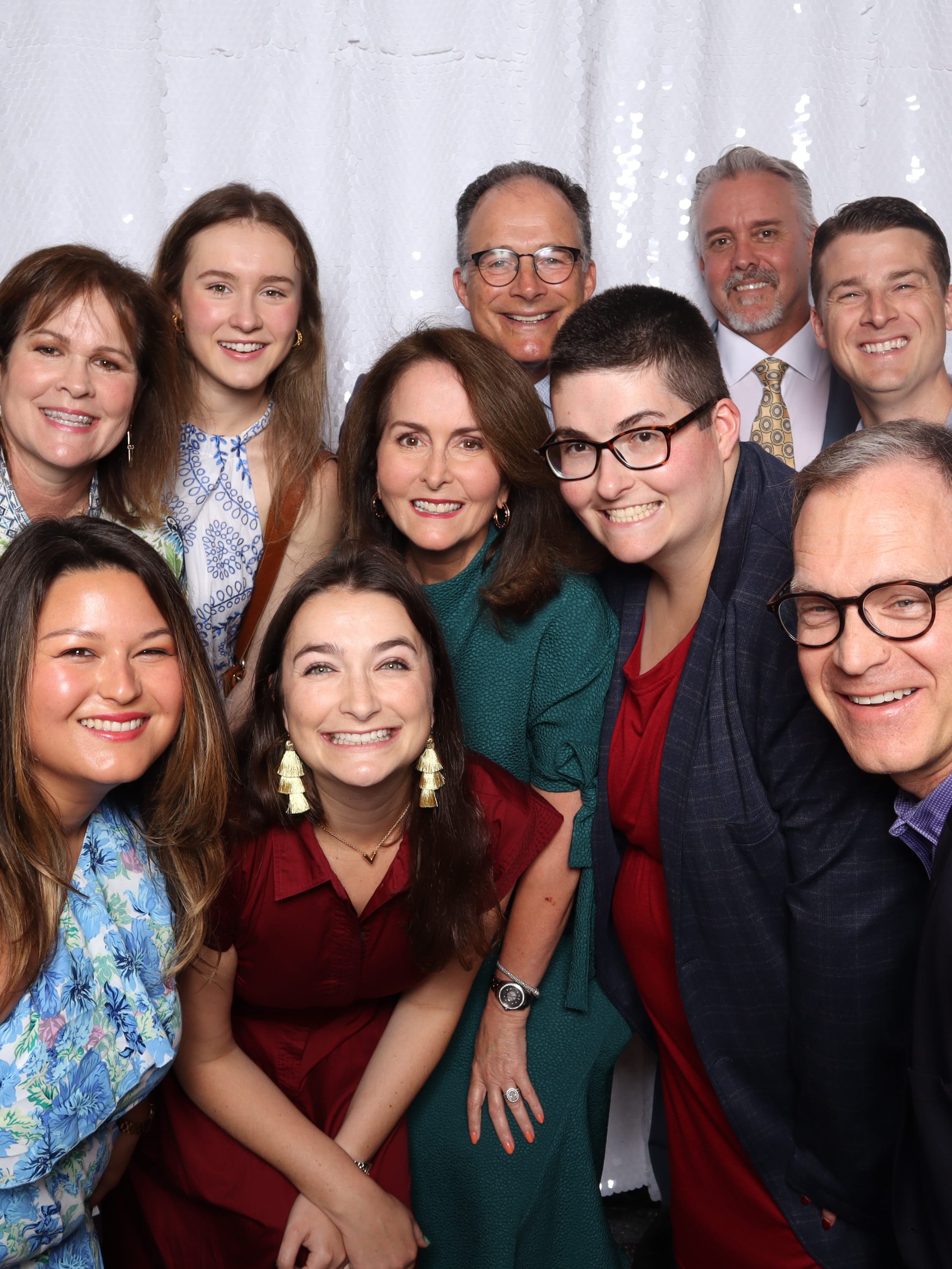 Team taking photos with Little Lemon Shots Photo booth