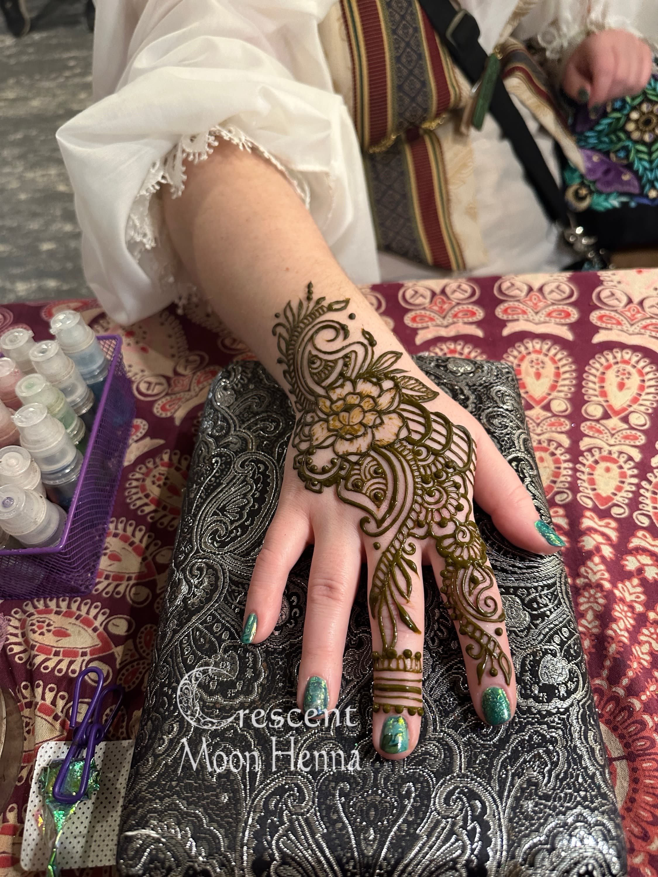 Henna design on hand