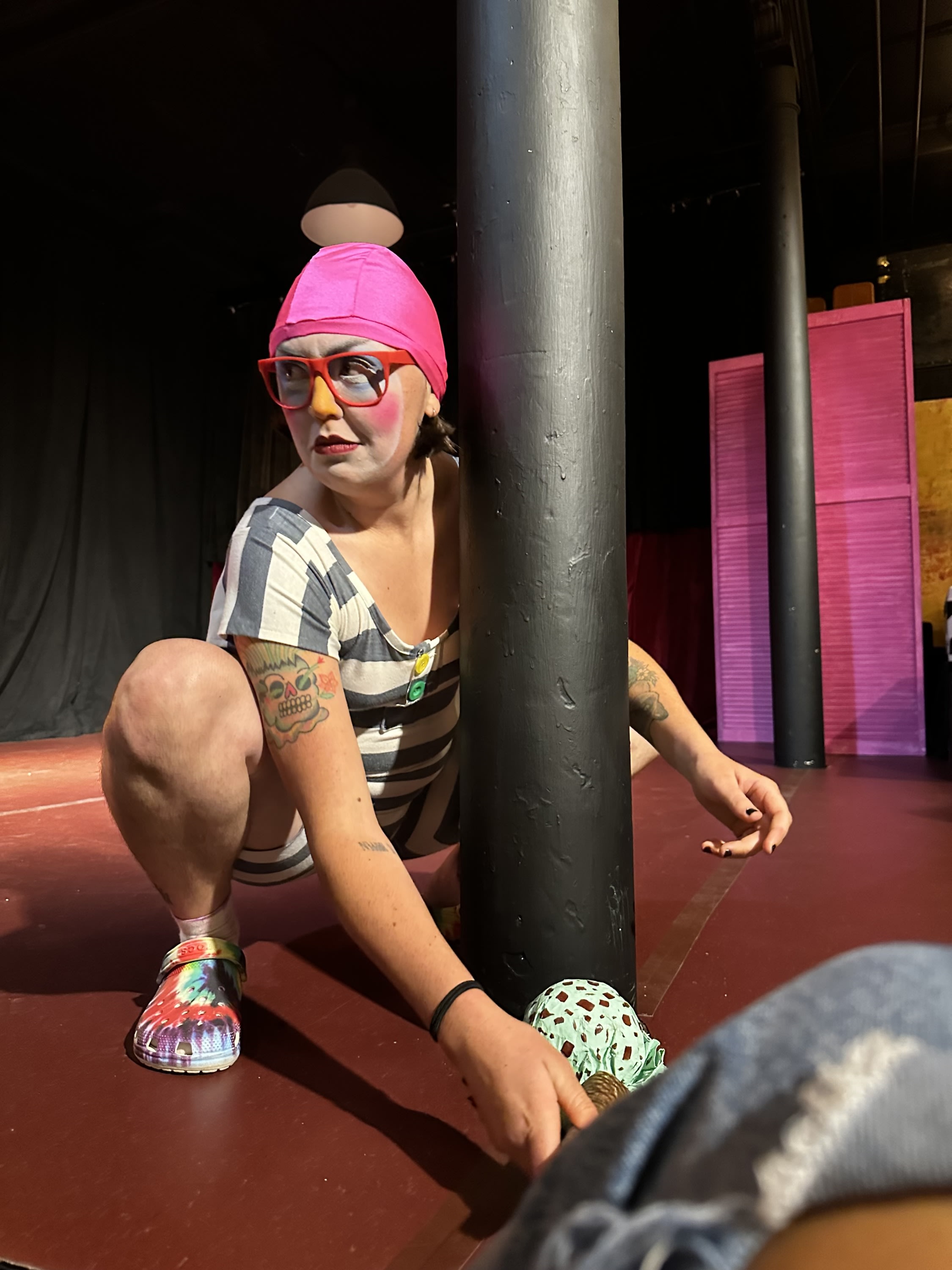 a clown around a pole