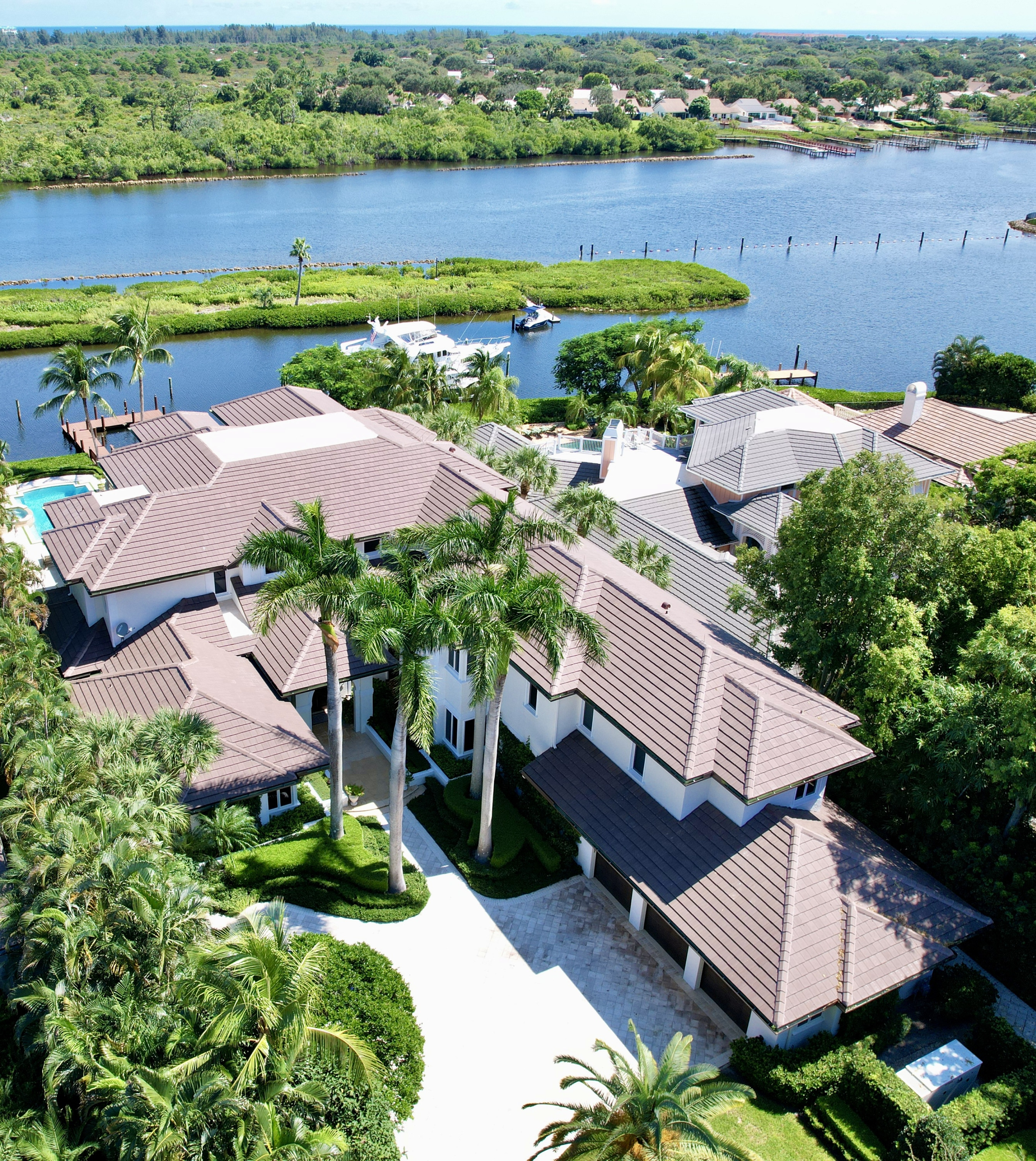Roofing Company Jupiter FL. New Roof. Flat Tile Color is Cocoa Range.