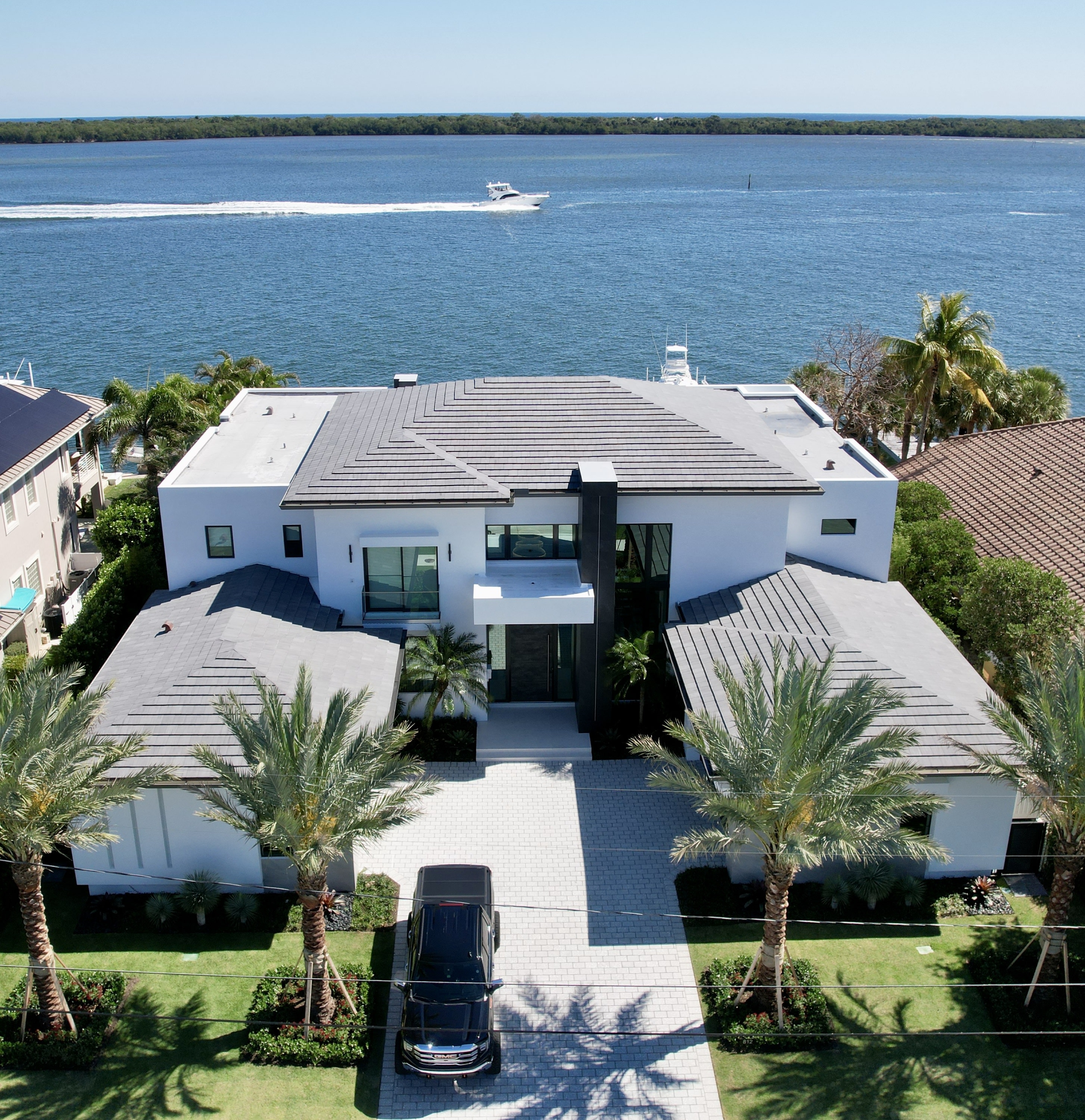 Roofing North Palm Beach. We replaced this roof and installed a flat concrete tile called Sierra Madre.