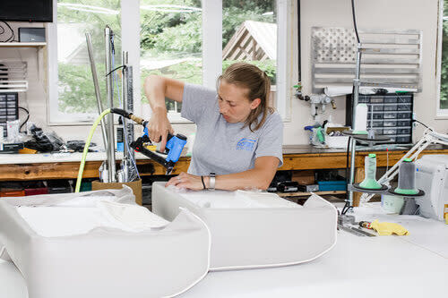 Stapling Seat Covers in the Shop
