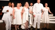 8 singers in white formal wear take the stage in CCCT's Sondheim on Sondheim
