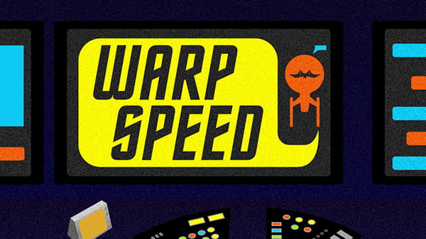 A dashboard of a spaceship with various controls. On the screen, a spaceship and the words Warp Speed.