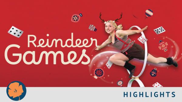 Dasher leaps through a hoop.