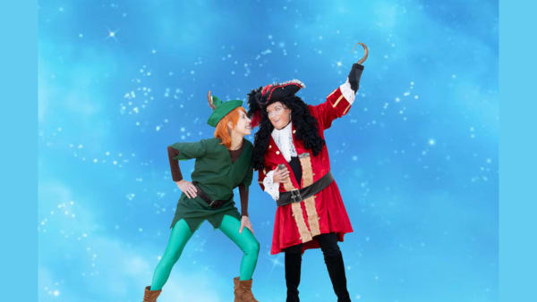 Peter Pan and Captain Hook pose at the ready for the show to begin.