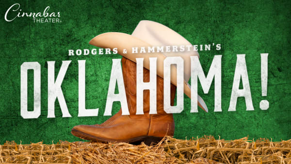 Cowboy boots and hat sit on a hay bale with a green background. Large white letters over the front say "Oklahoma!"