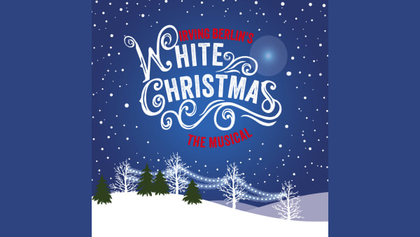 White Christmas words, blue background and white snowflakes
