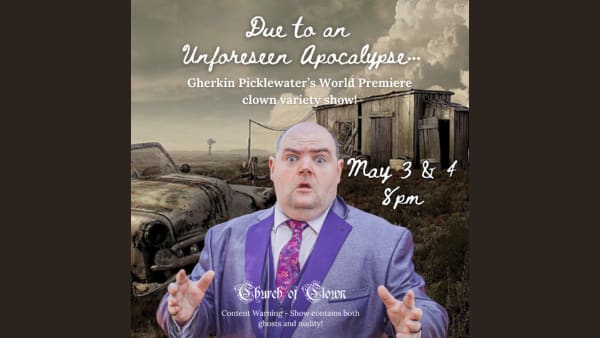 Foreground shows bald white man with a purple suit looking concerned and in mid sentence. Background shows brown hill of dead