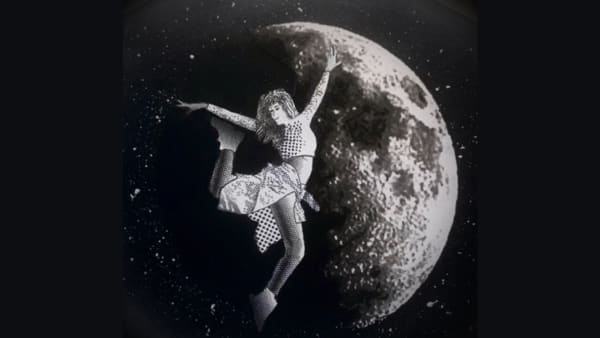 figure dancing in front of the moon