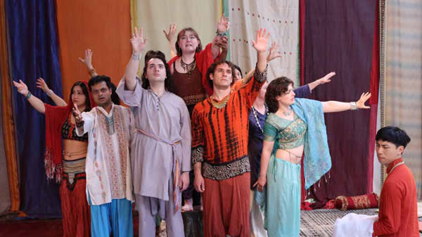 Ensemble actors and musicians perform a scene from "The Arabian Nights."